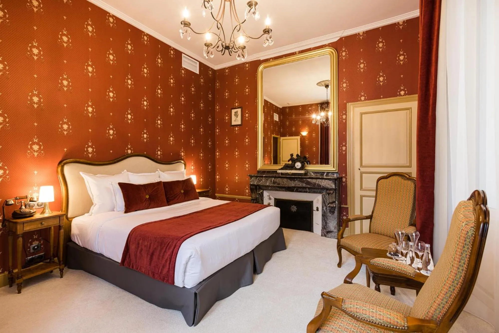 Photo of the whole room, Bed in LE PETIT MANOIR