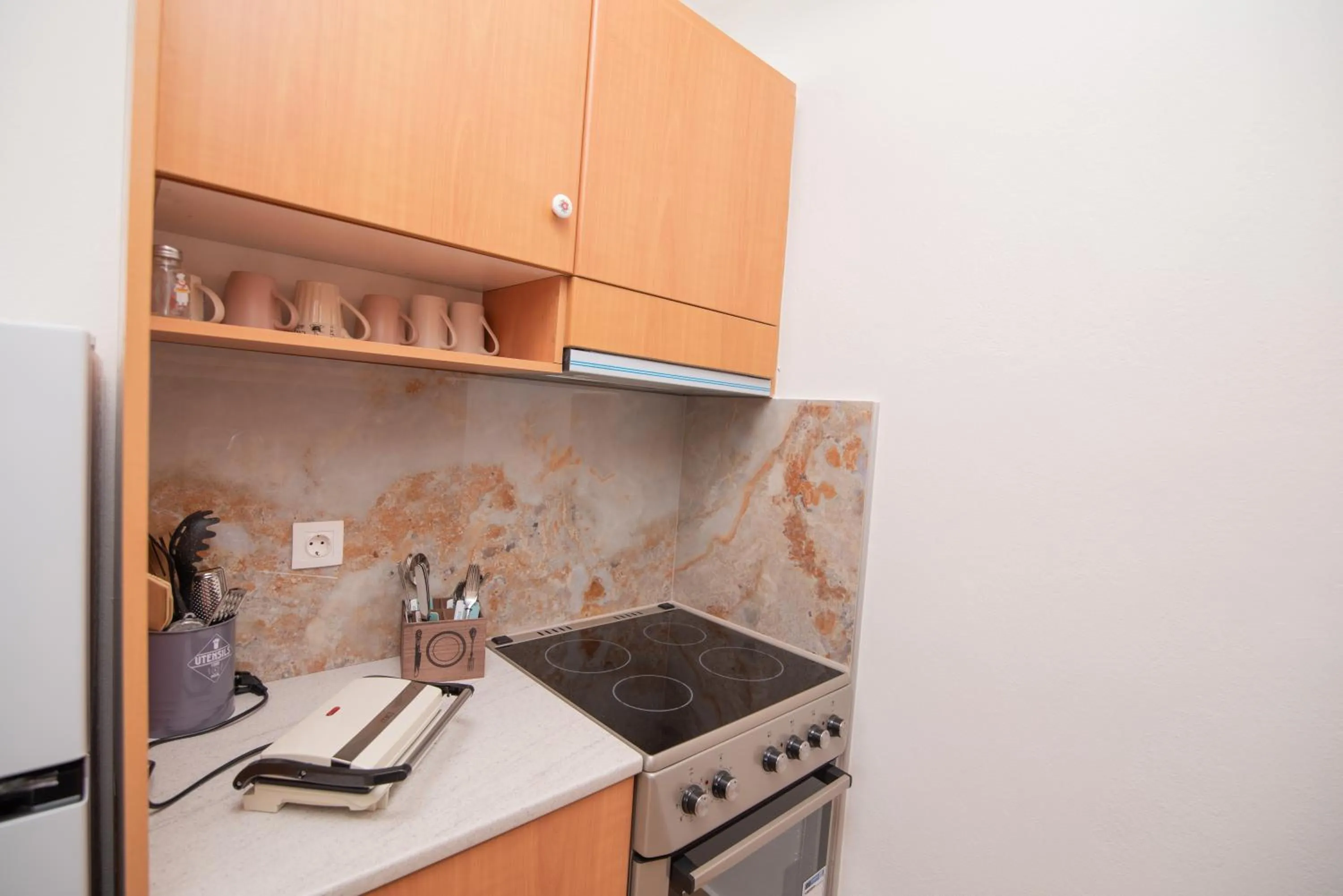 kitchen in Tsaner Apartment and Rooms