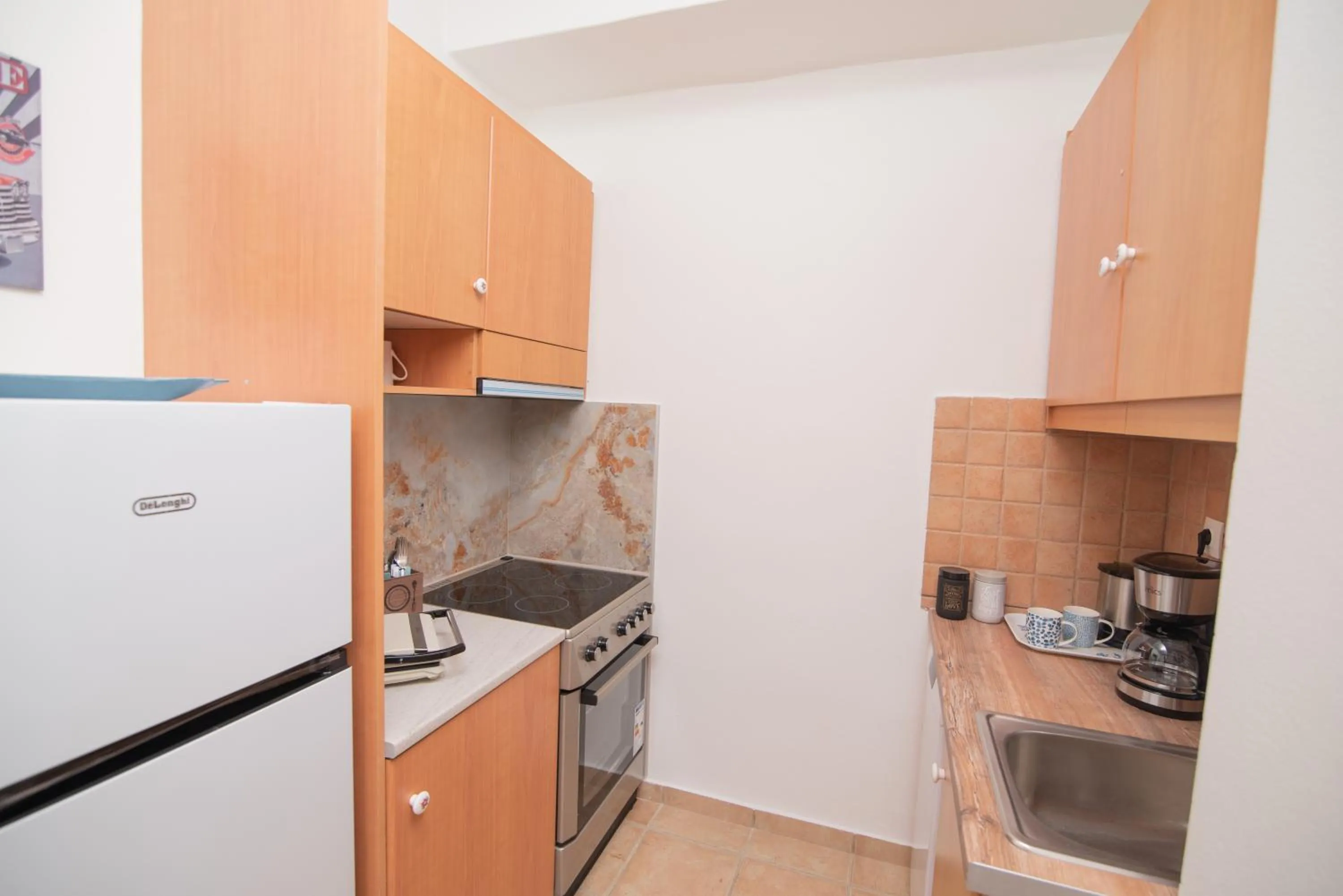 kitchen in Tsaner Apartment and Rooms