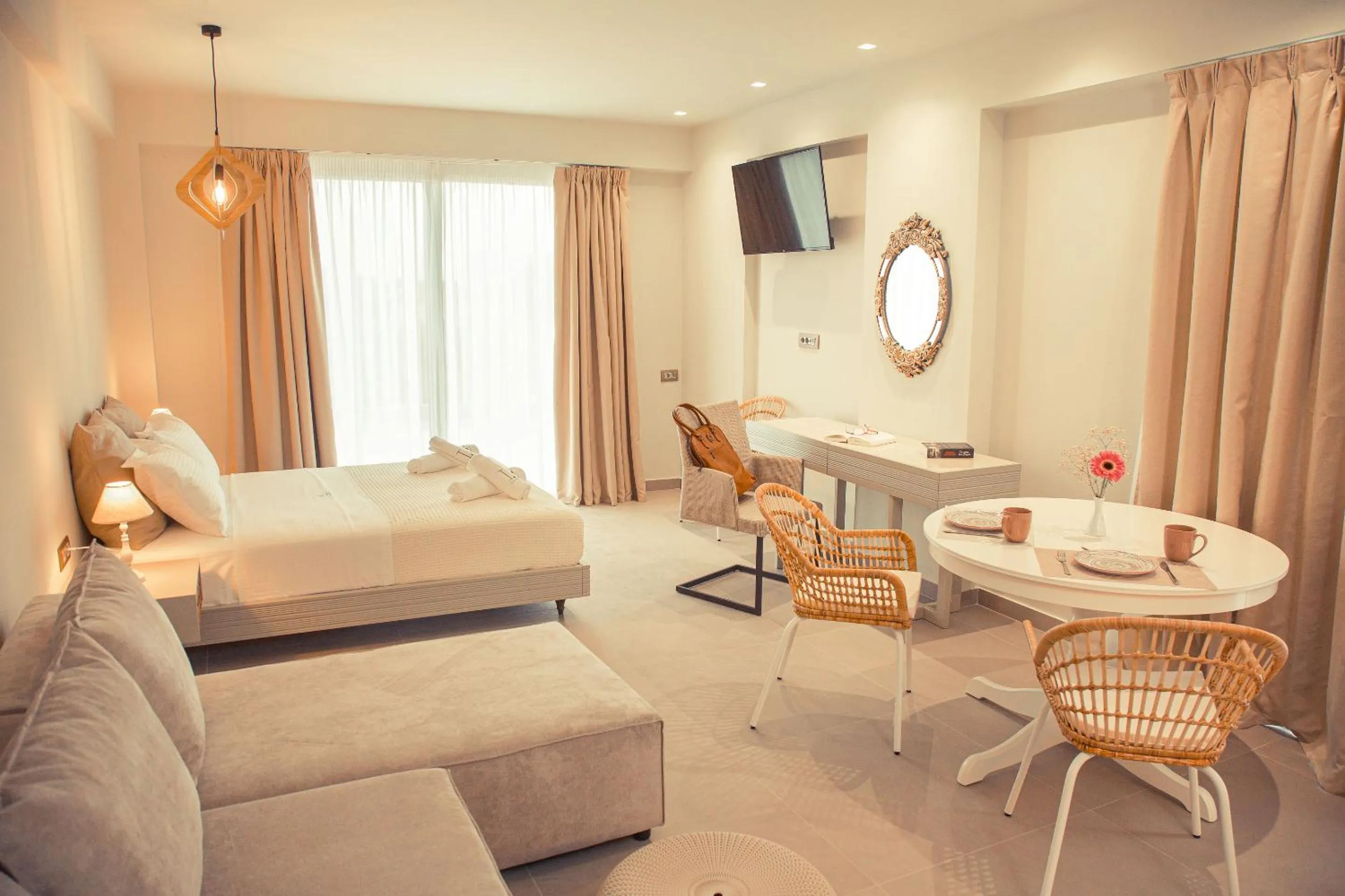 Bed in IO Luxury Pool & Hot Tub Suites