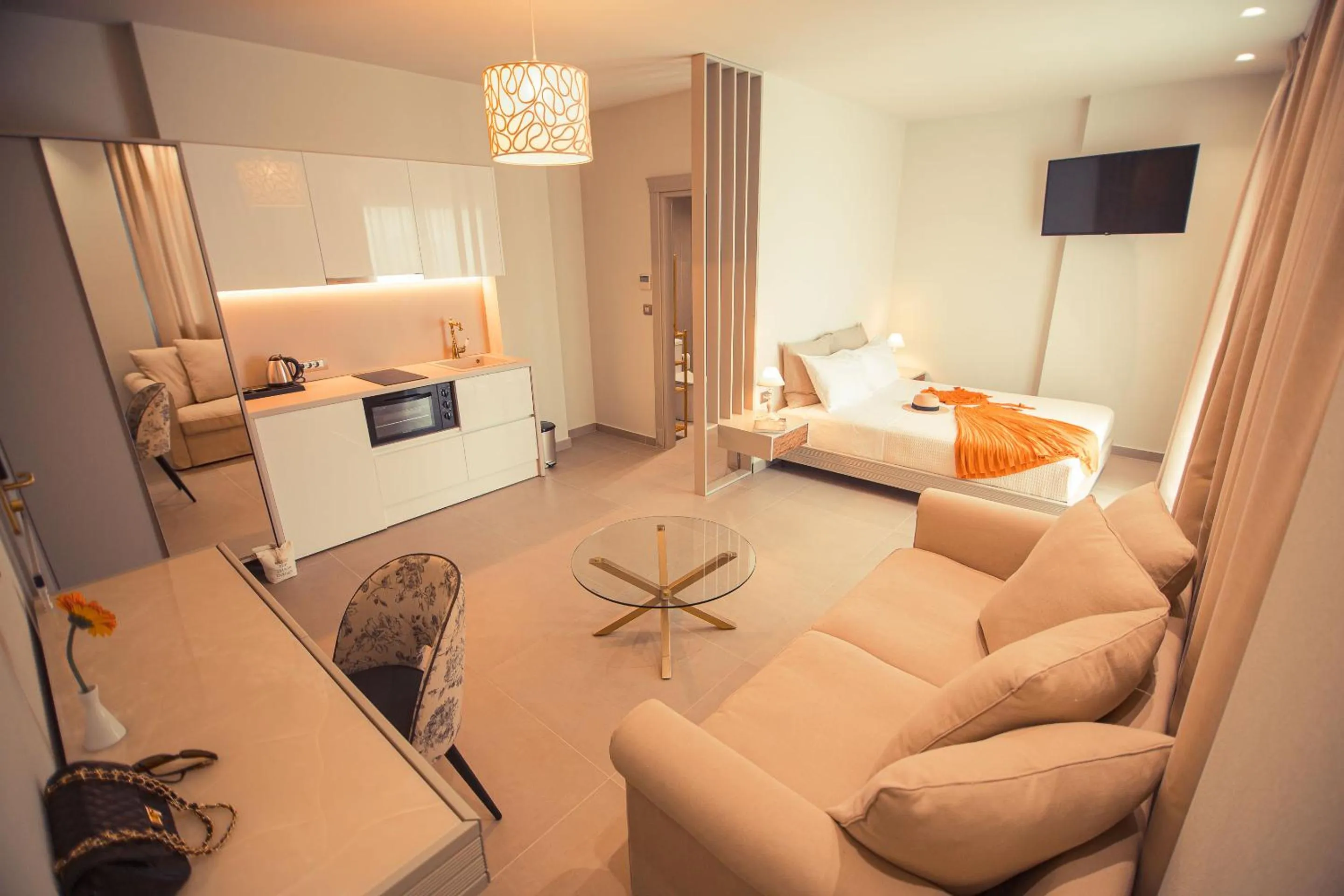 Bed in IO Luxury Pool & Hot Tub Suites