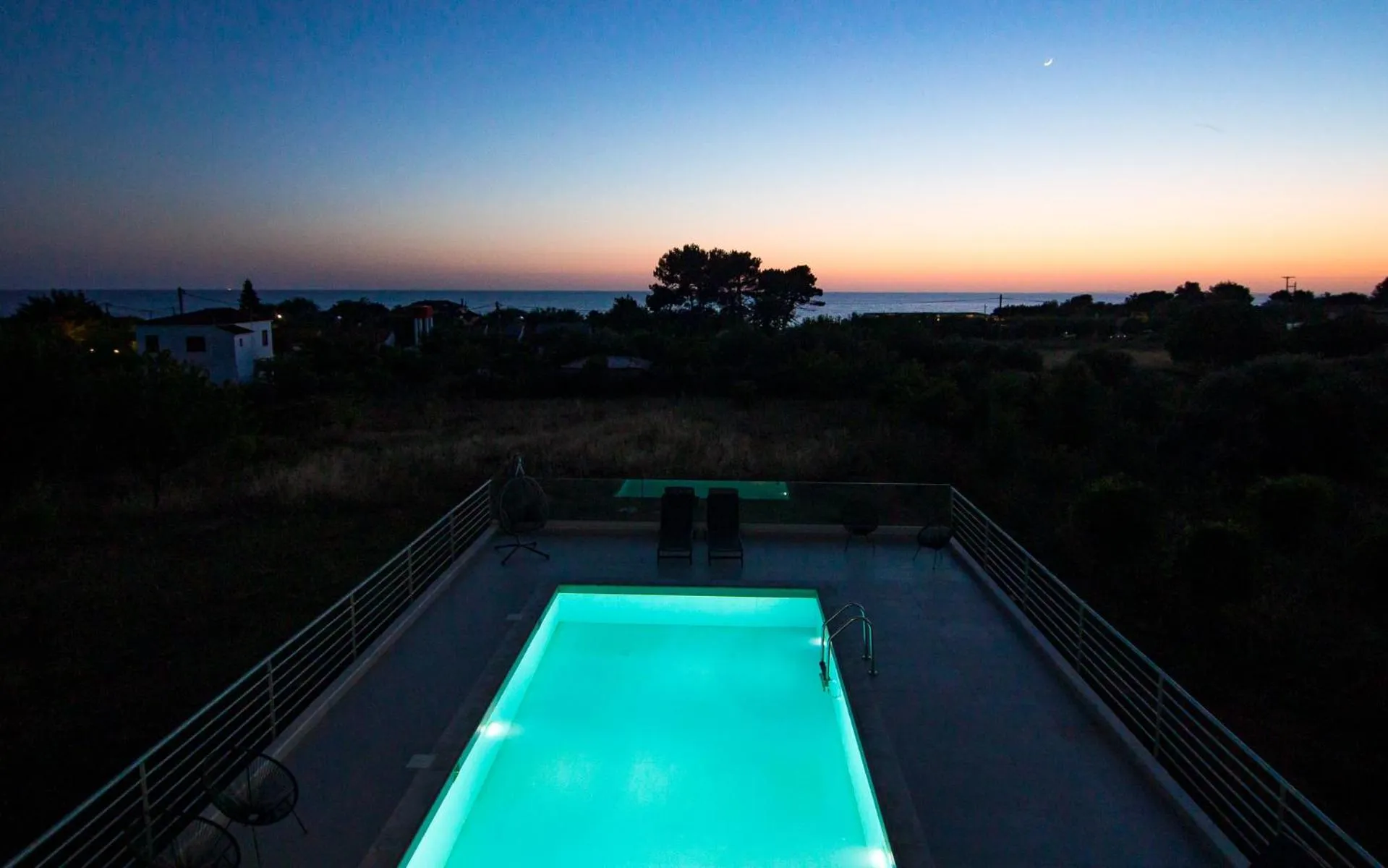 Sunset in IO Luxury Pool & Hot Tub Suites