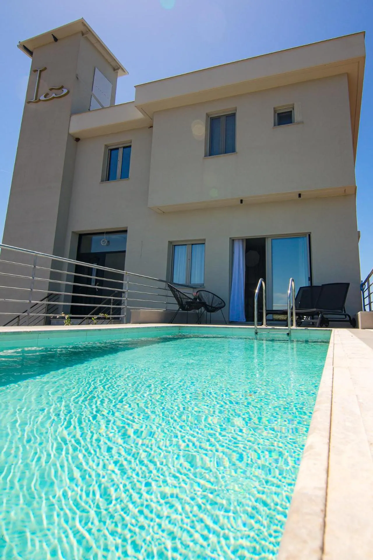 Day in IO Luxury Pool & Hot Tub Suites