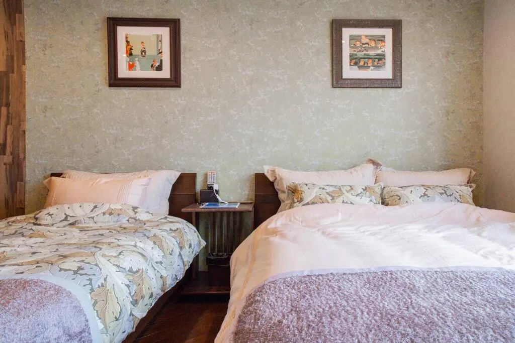 Bed in THE BLAUBAUM TOYA