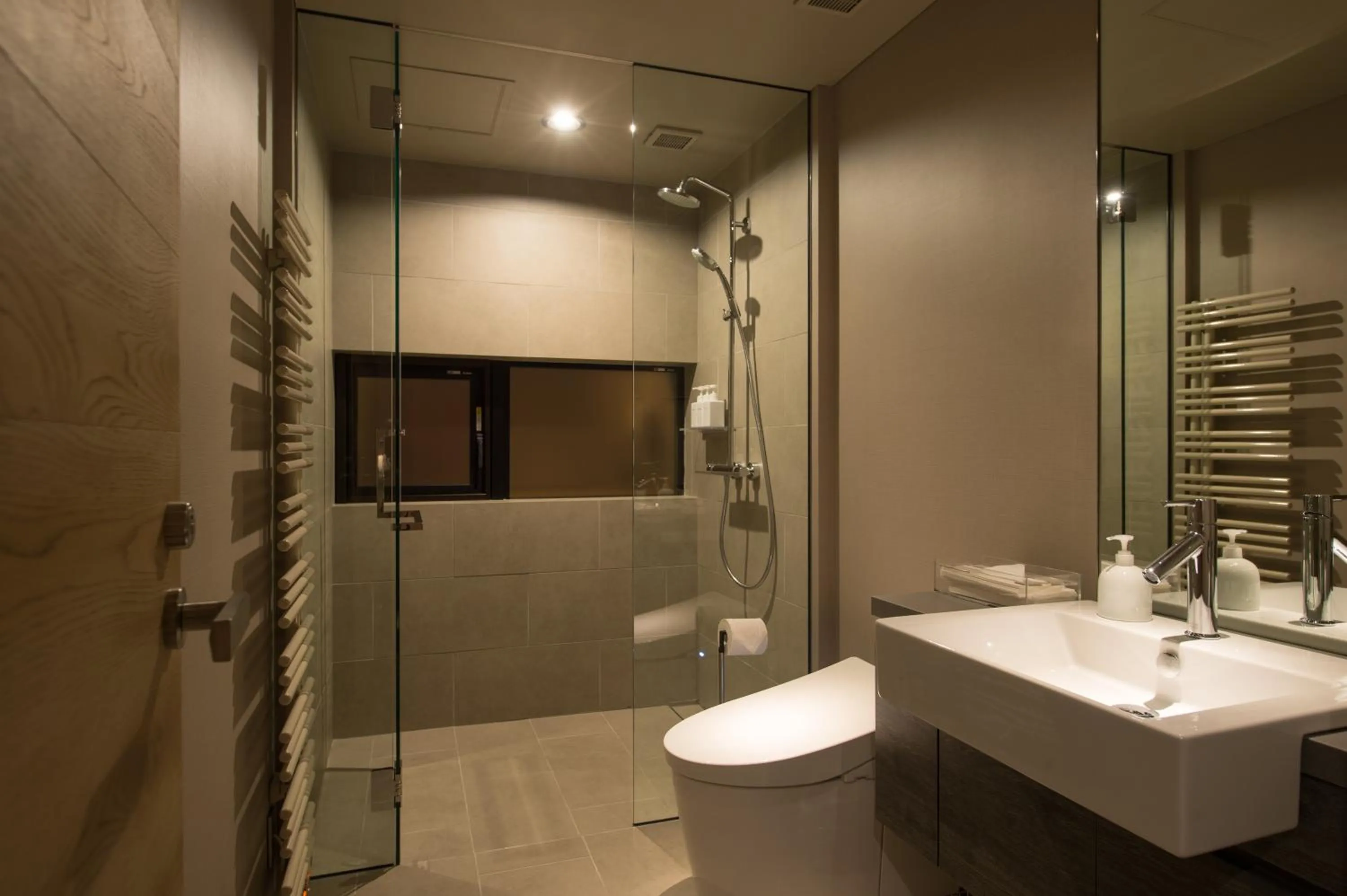 Shower in Aspect Luxury Apartments by H2 Life