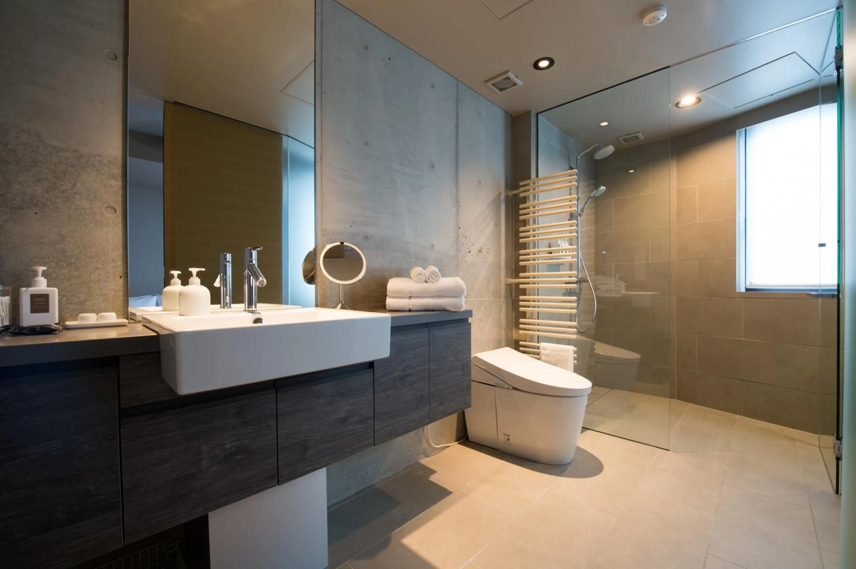 Shower in Aspect Luxury Apartments by H2 Life