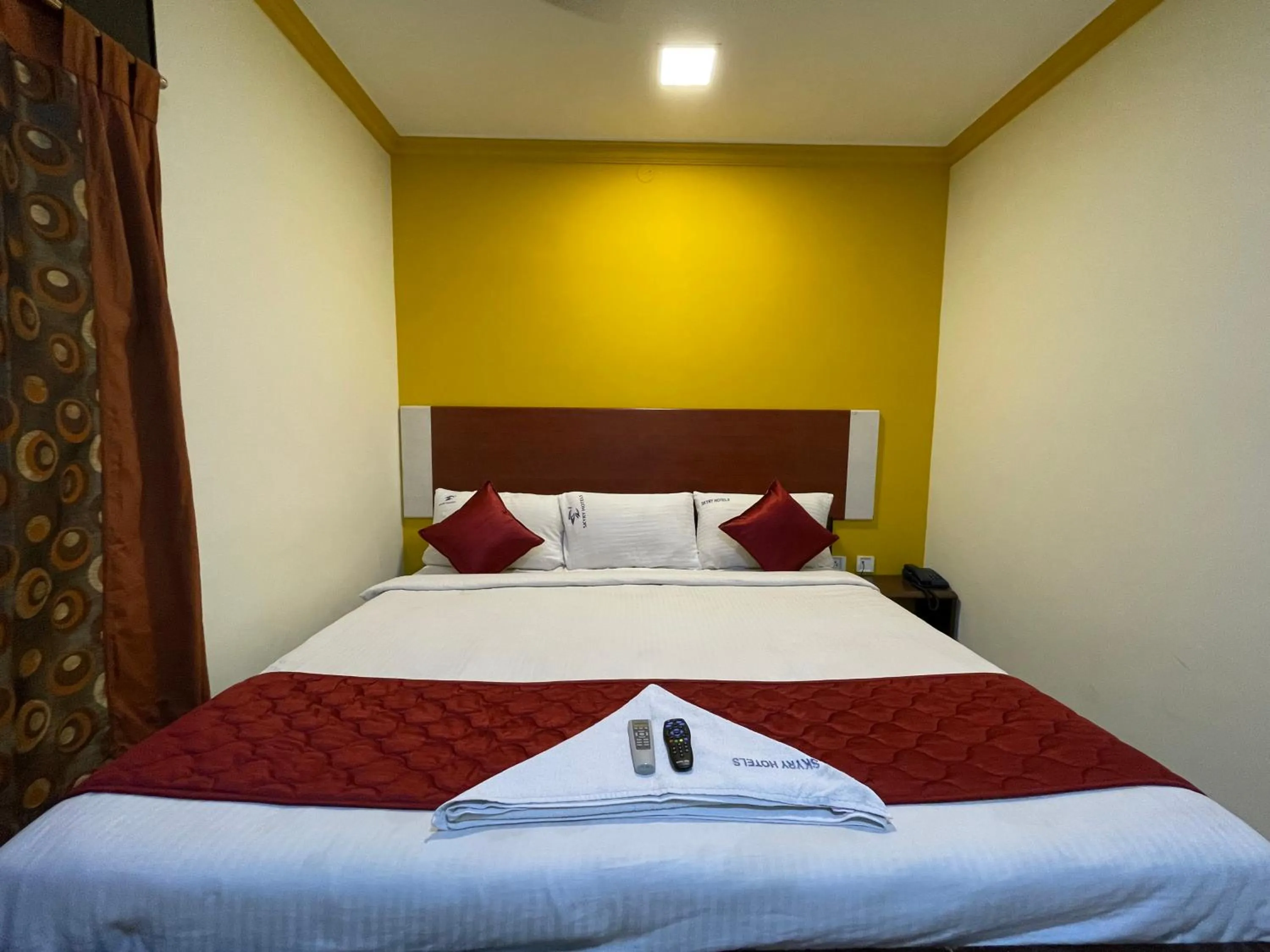 Bed in Skyry Hotels Adyar