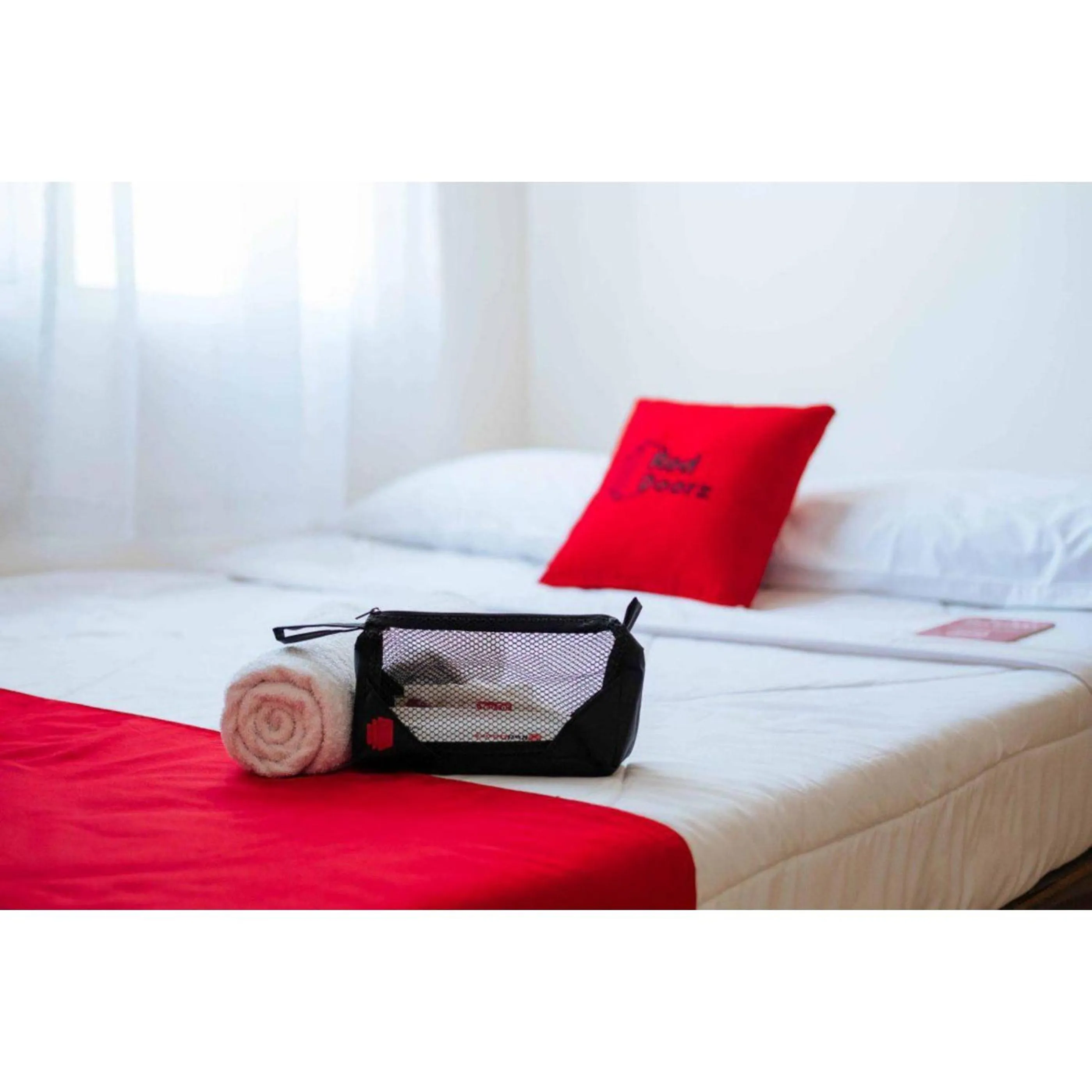 Bed in RedDoorz Syariah near RSUD Kota Malang