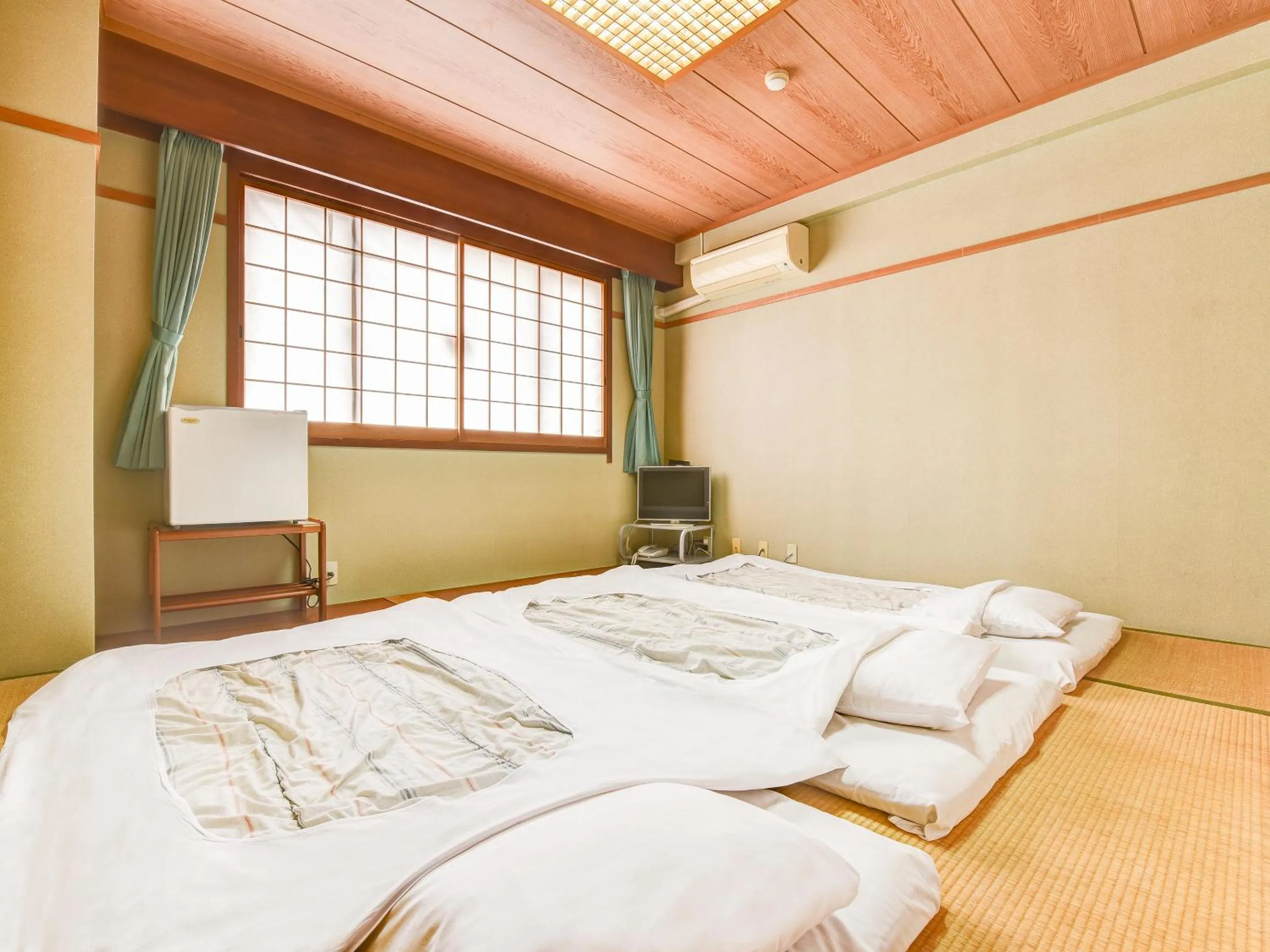 Photo of the whole room, Bed in Hotel Primrose Saito
