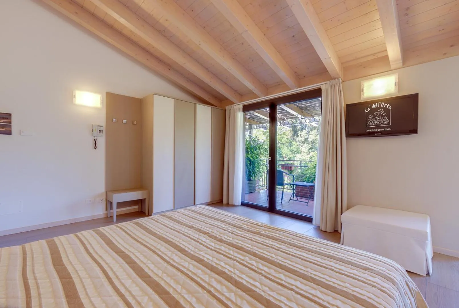 Bed in Cà dell'Orto Rooms & Apartments