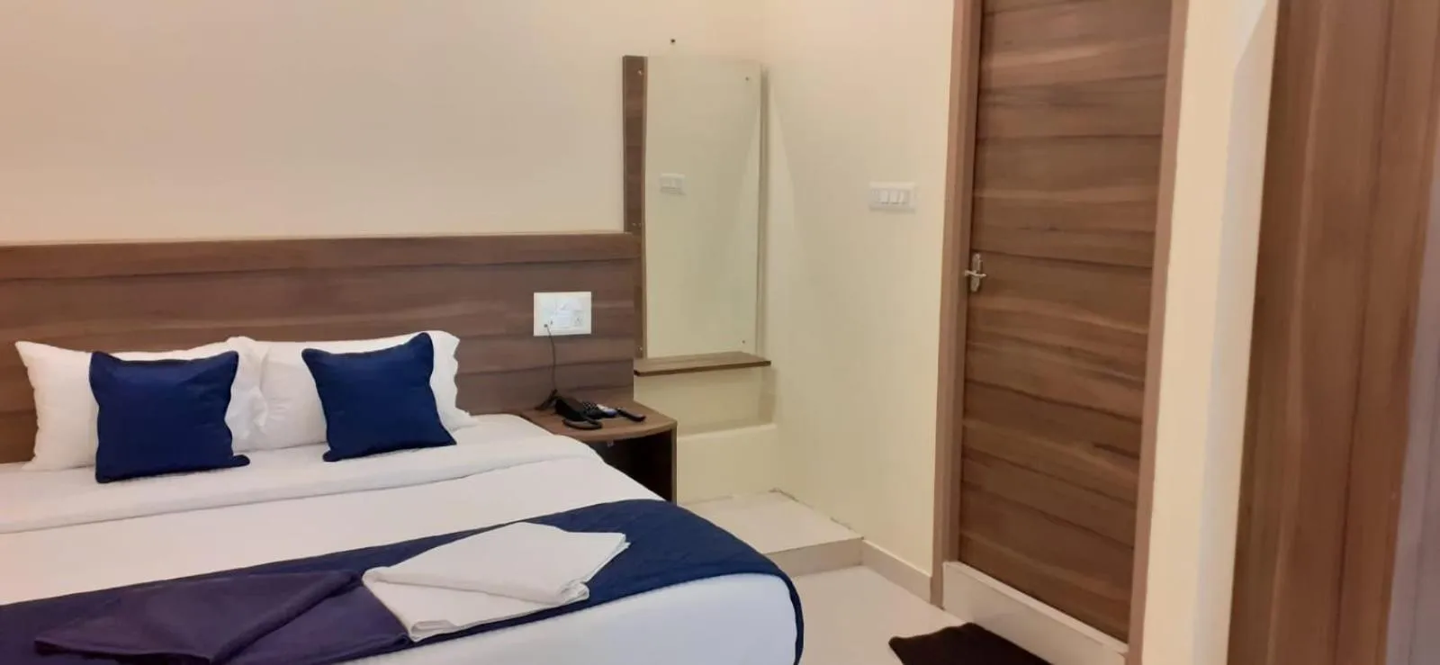 Photo of the whole room, Bed in NJK Residency