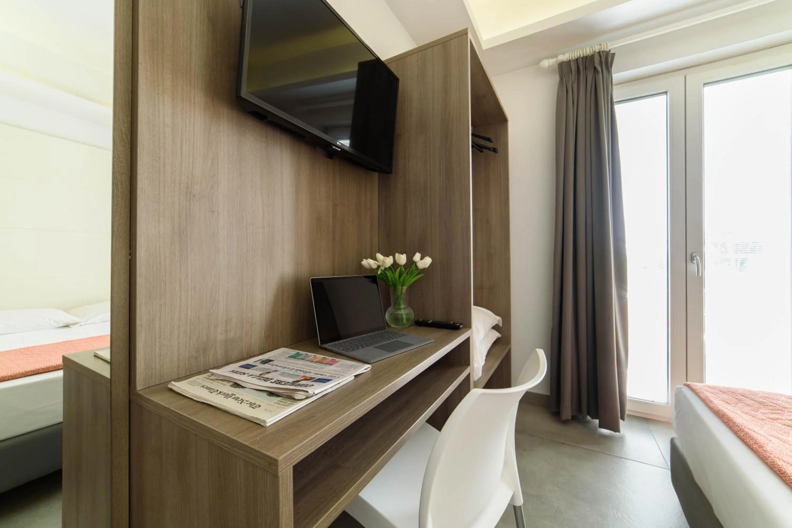 Bedroom in Hotel La Mela