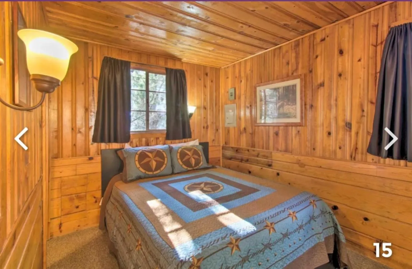 Bed in Hidden Rest Cabins and Resort