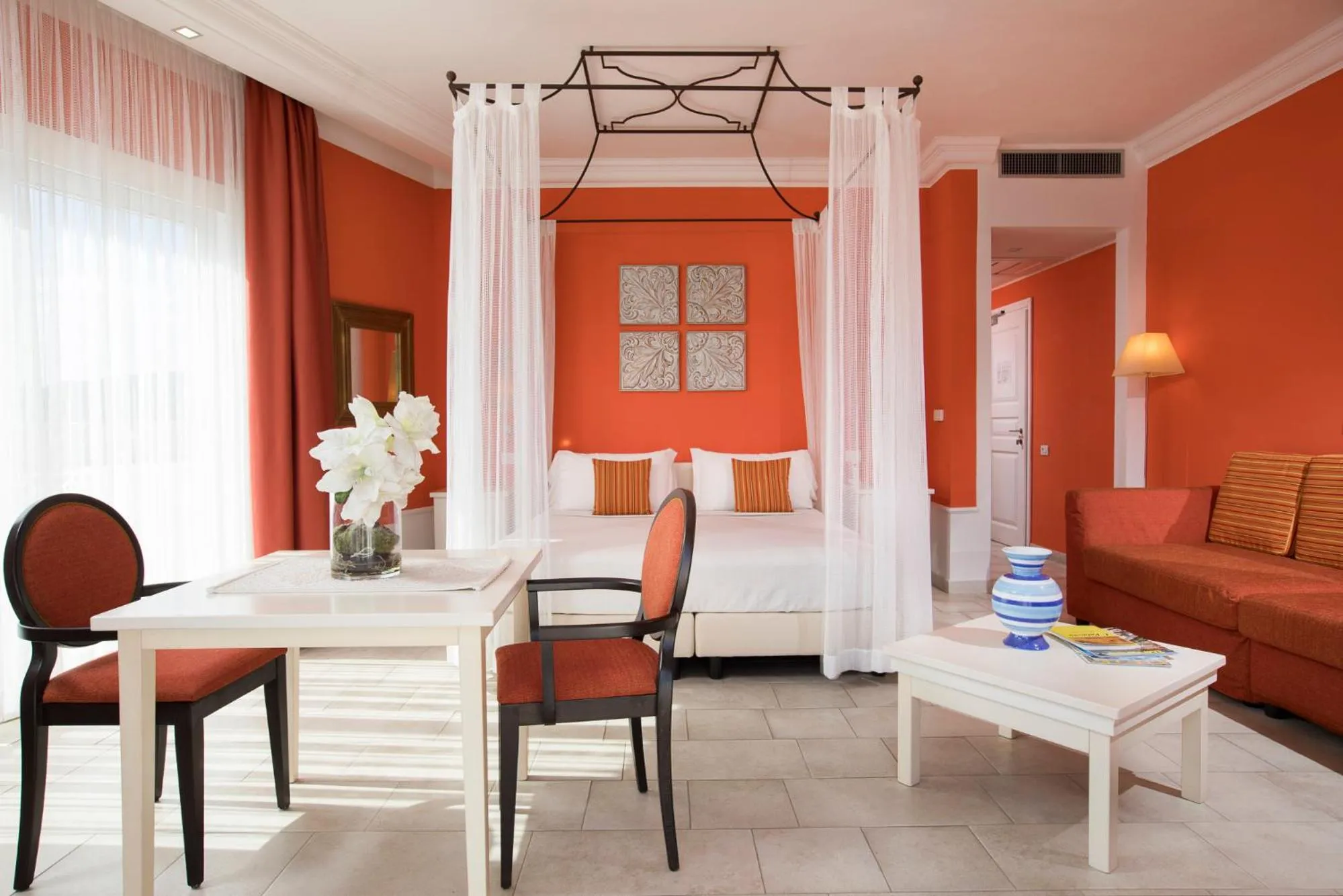 Seating area, Bed in Lu' Hotel Riviera - Carloforte