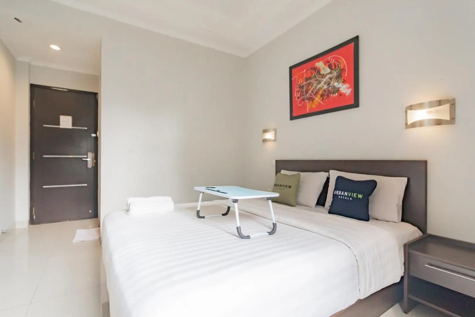 Photo of the whole room, Bed in Urbanview Hotel Grand Malabar Bandung