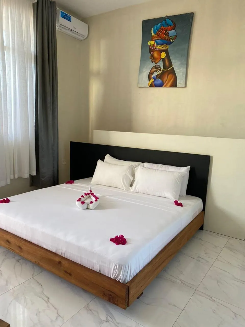 Bed in Ocean Breeze Hotel