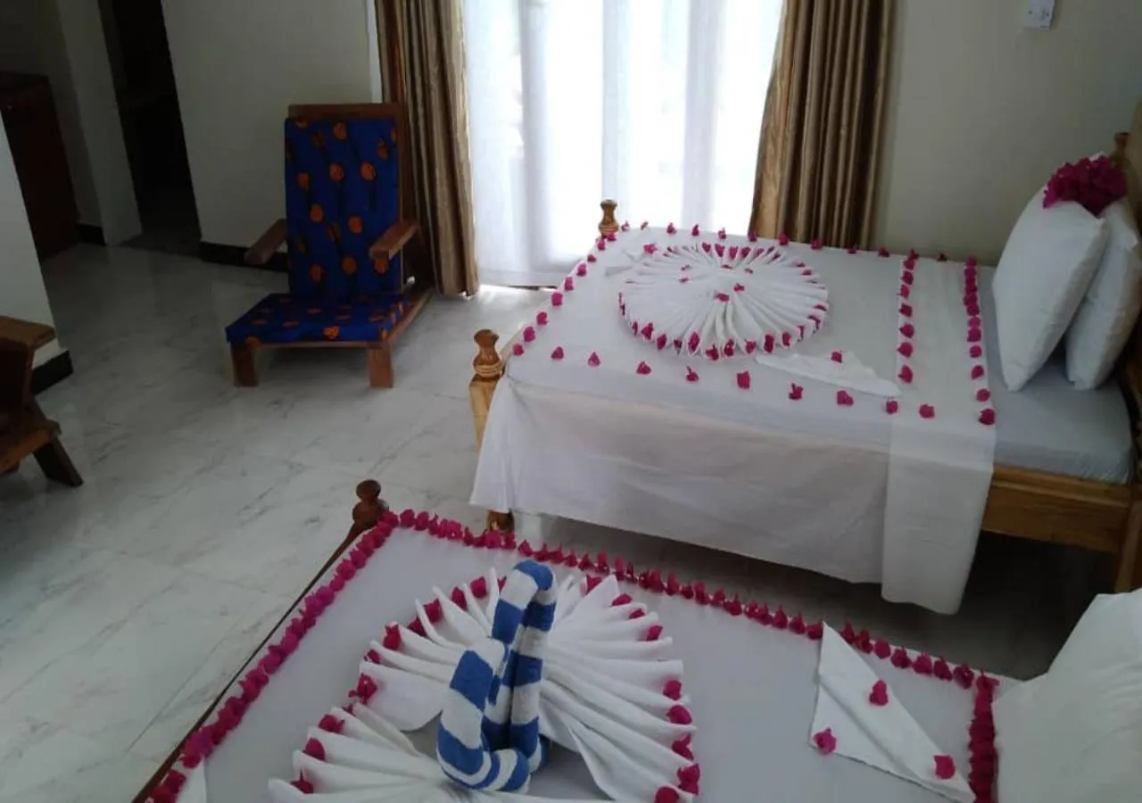 Bedroom in Ocean Breeze Hotel