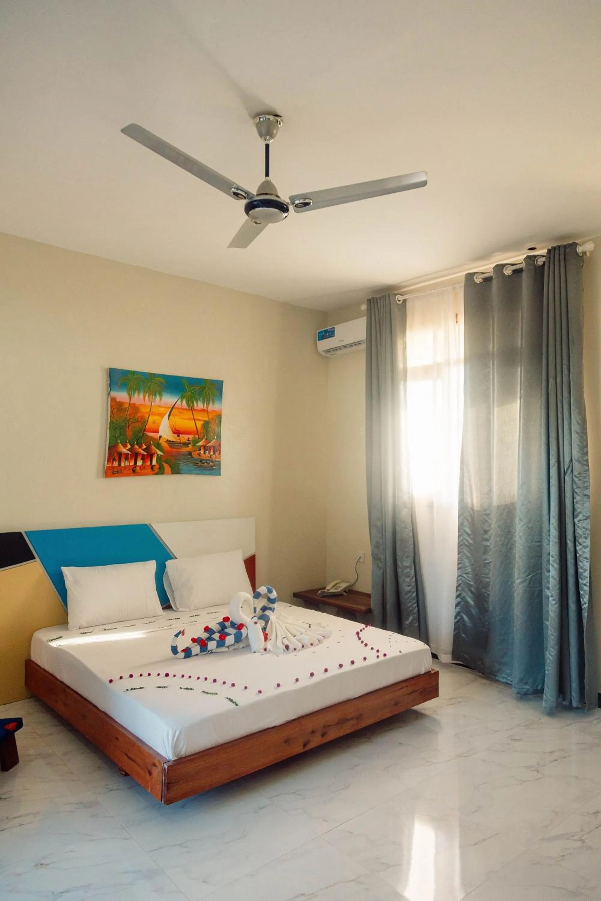 Bed in Ocean Breeze Hotel