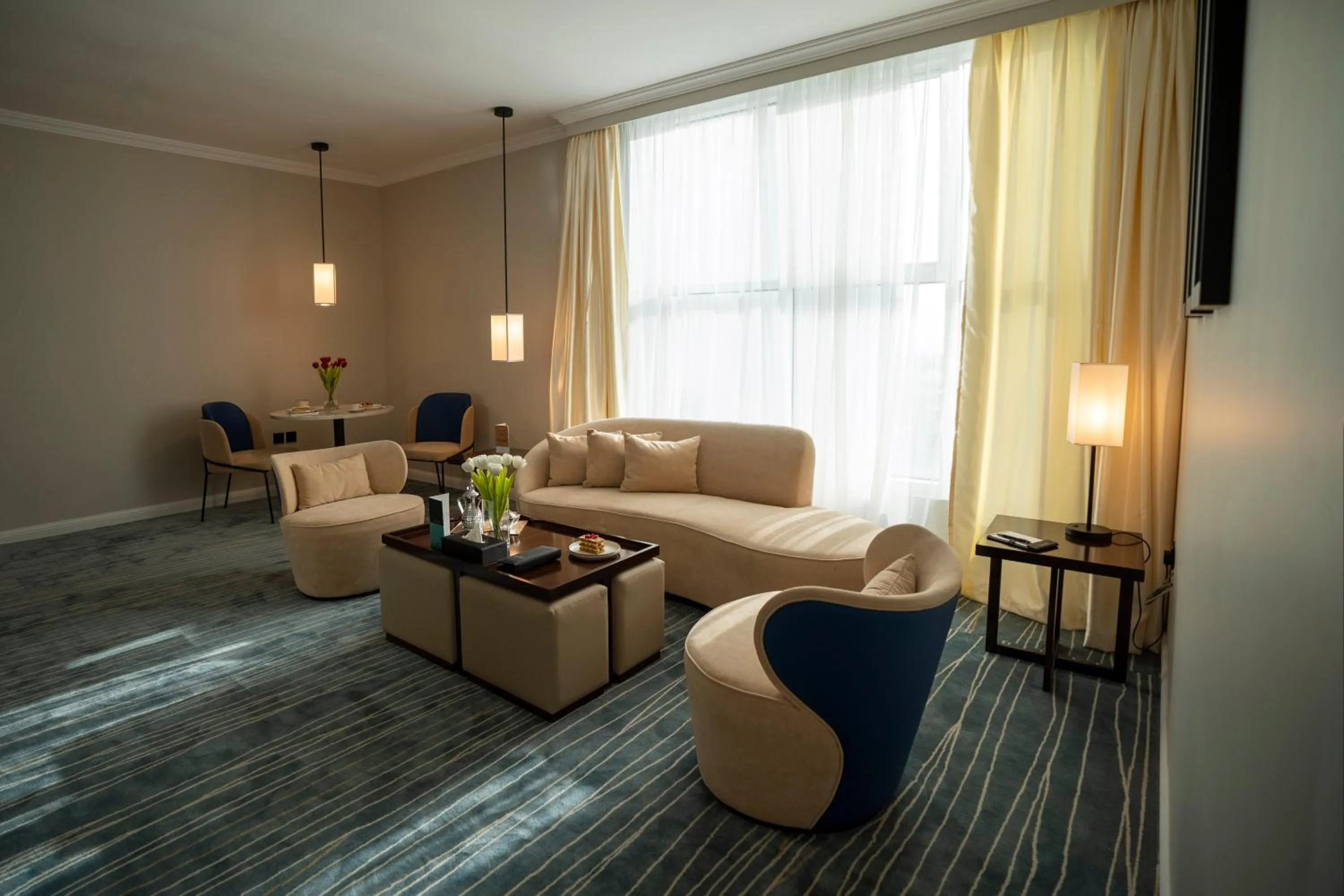 Living room in Prime Al Corniche Hotel