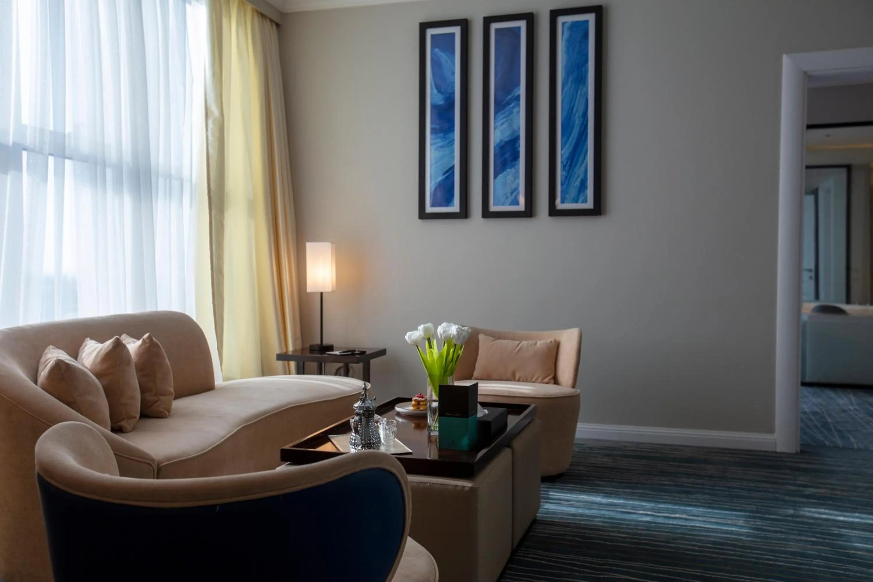 Living room in Prime Al Corniche Hotel