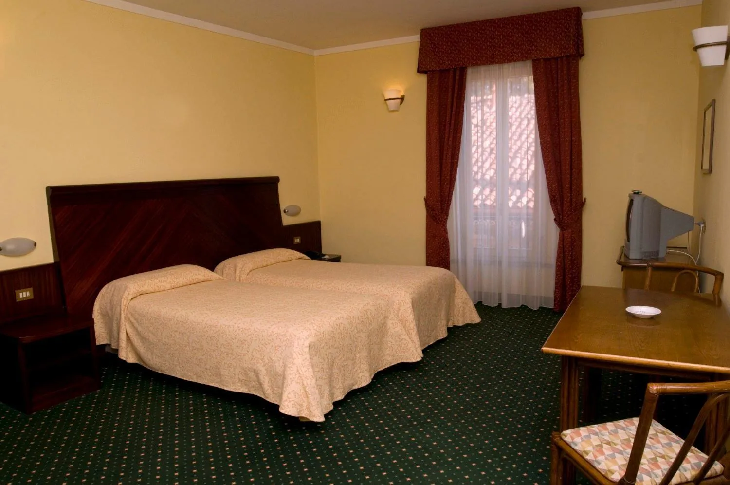 Bed in Europalace Hotel