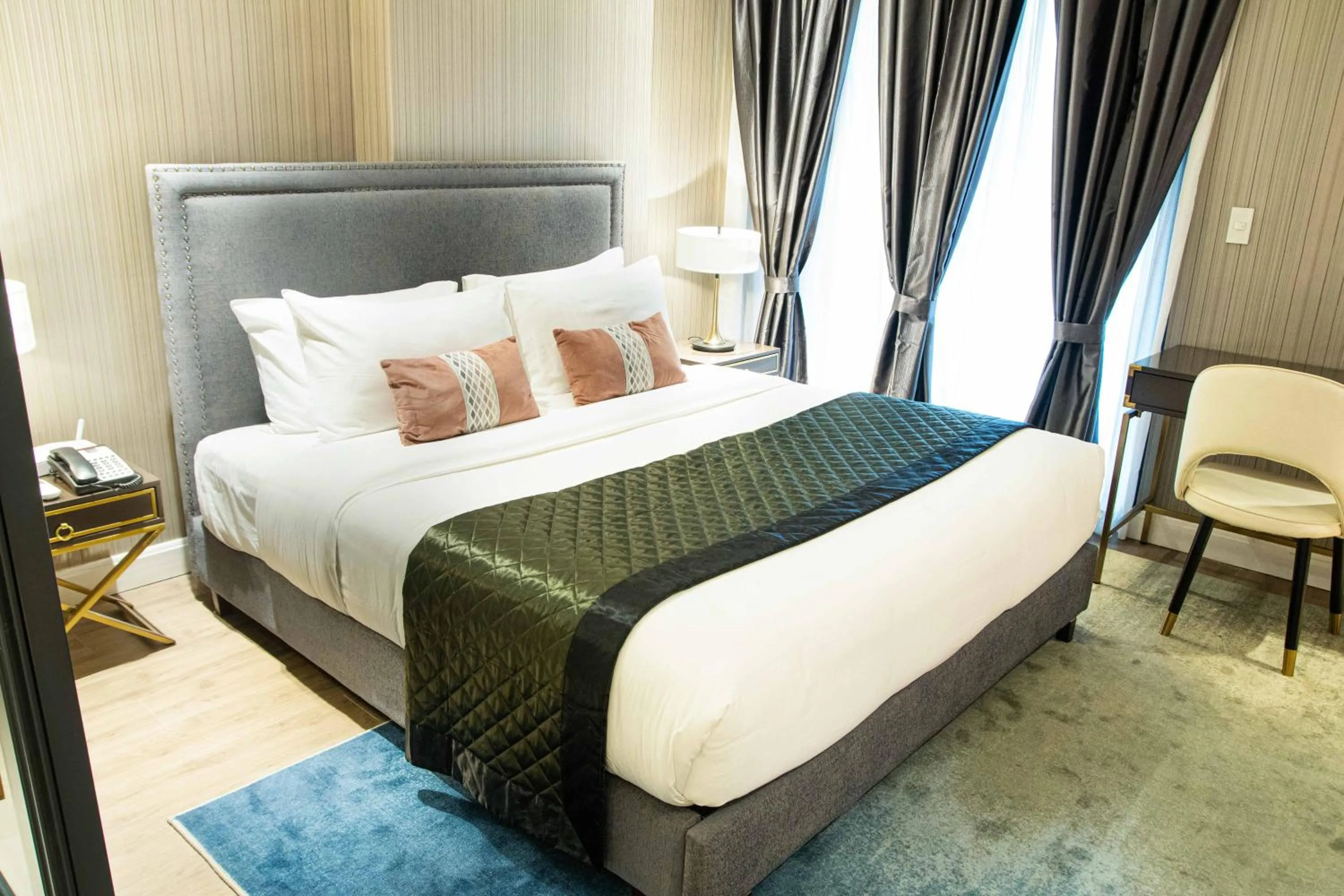 Bed in Noble Cebu Hotel