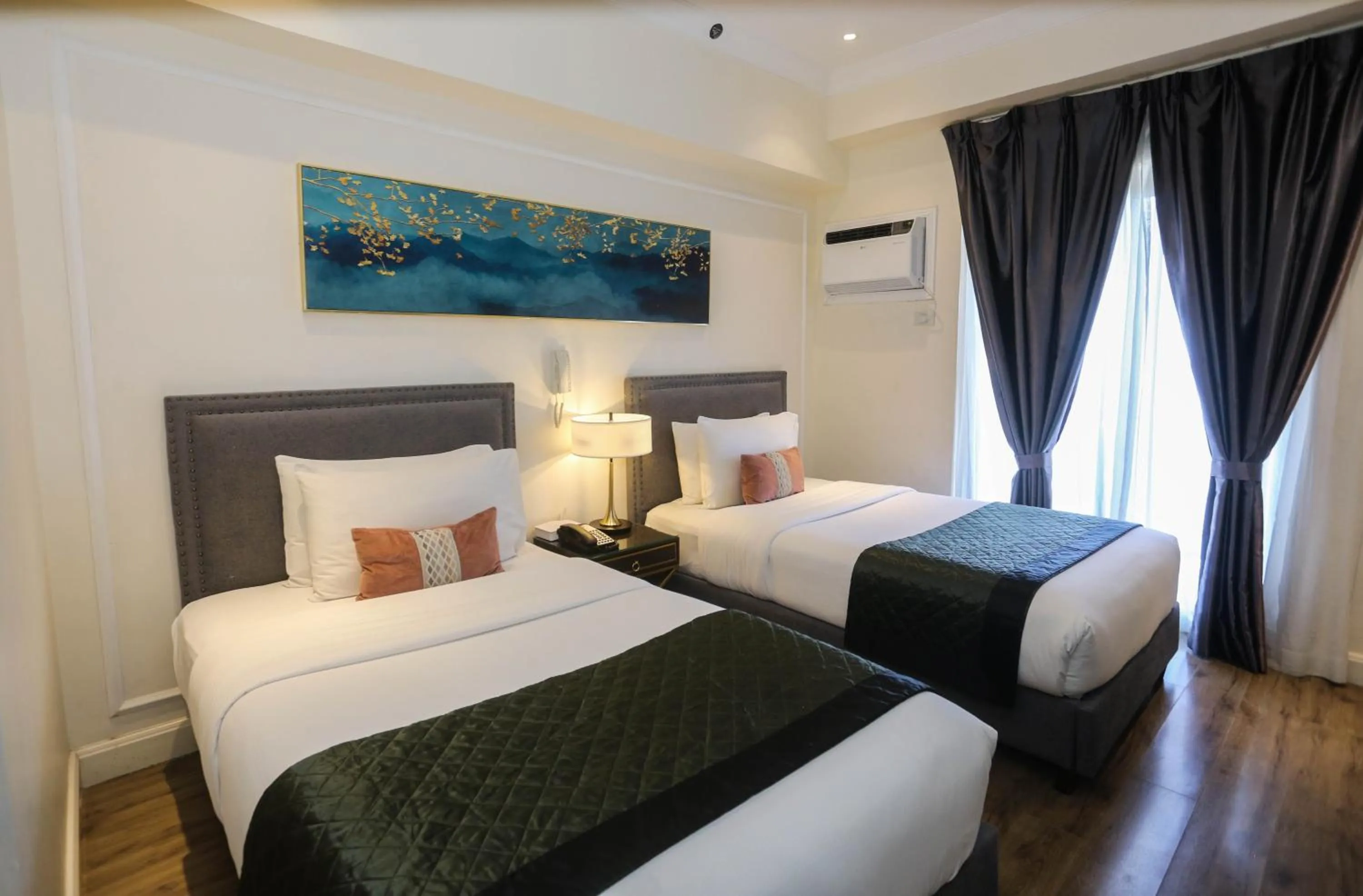 Bed in Noble Cebu Hotel