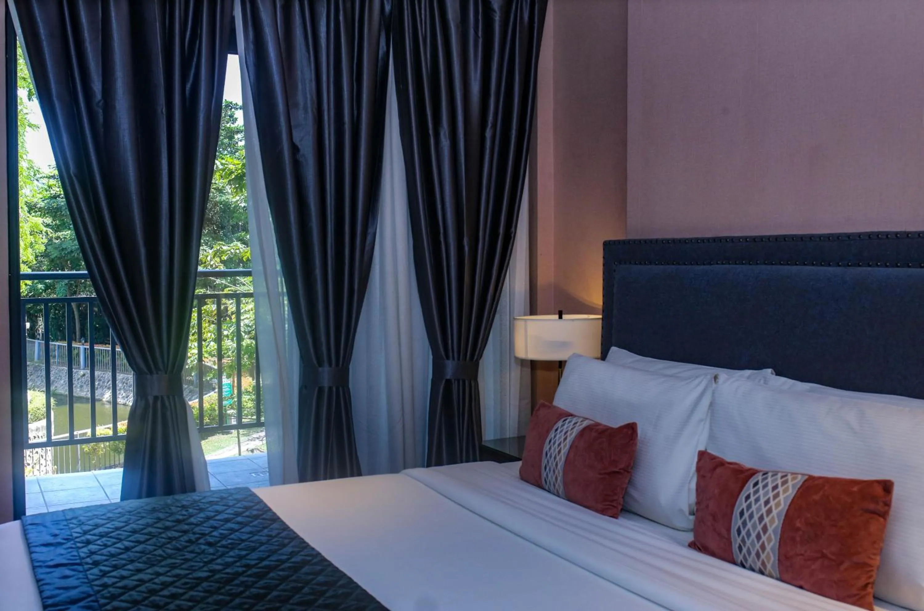 Bed in Noble Cebu Hotel