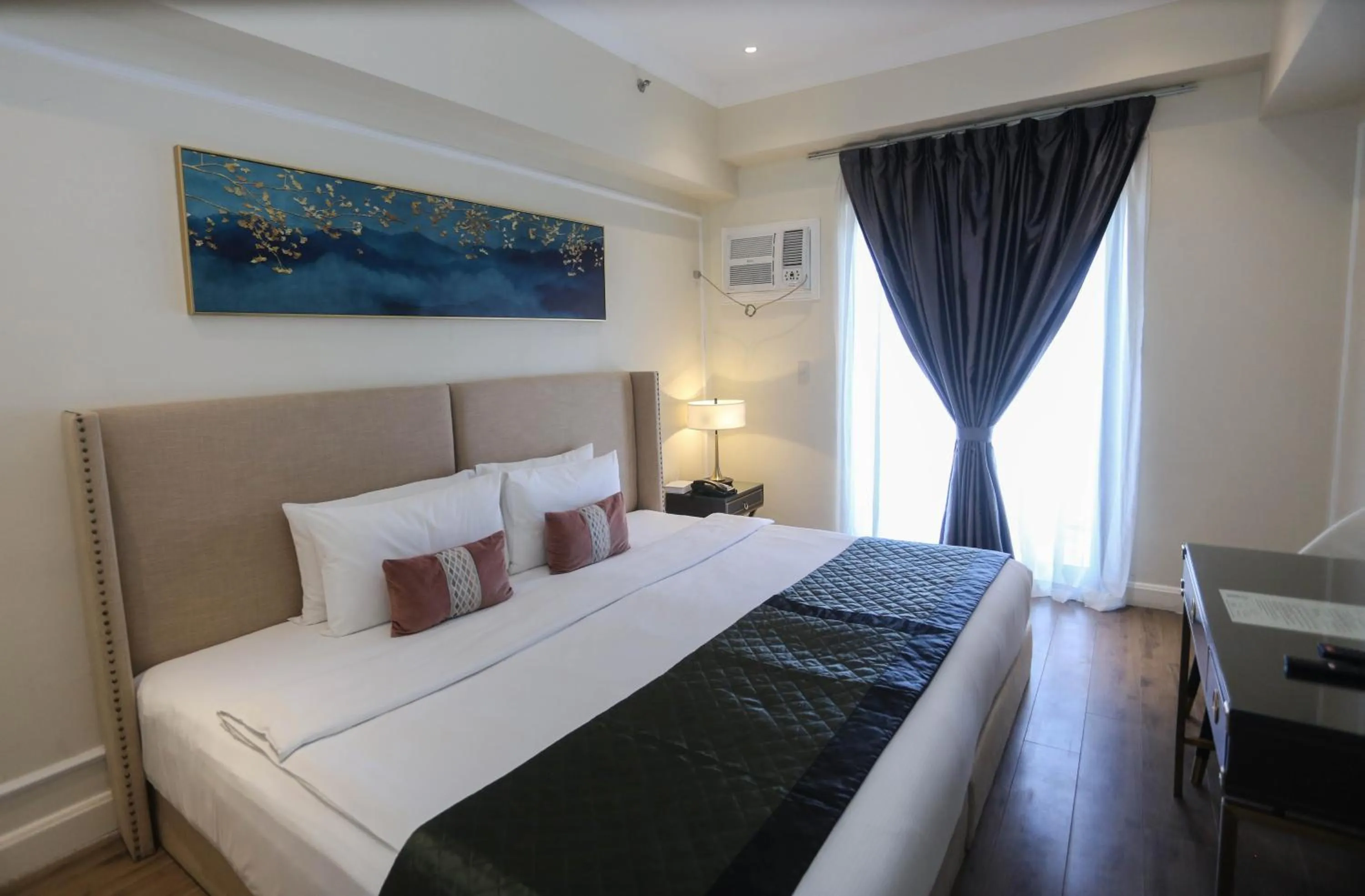 Bed in Noble Cebu Hotel