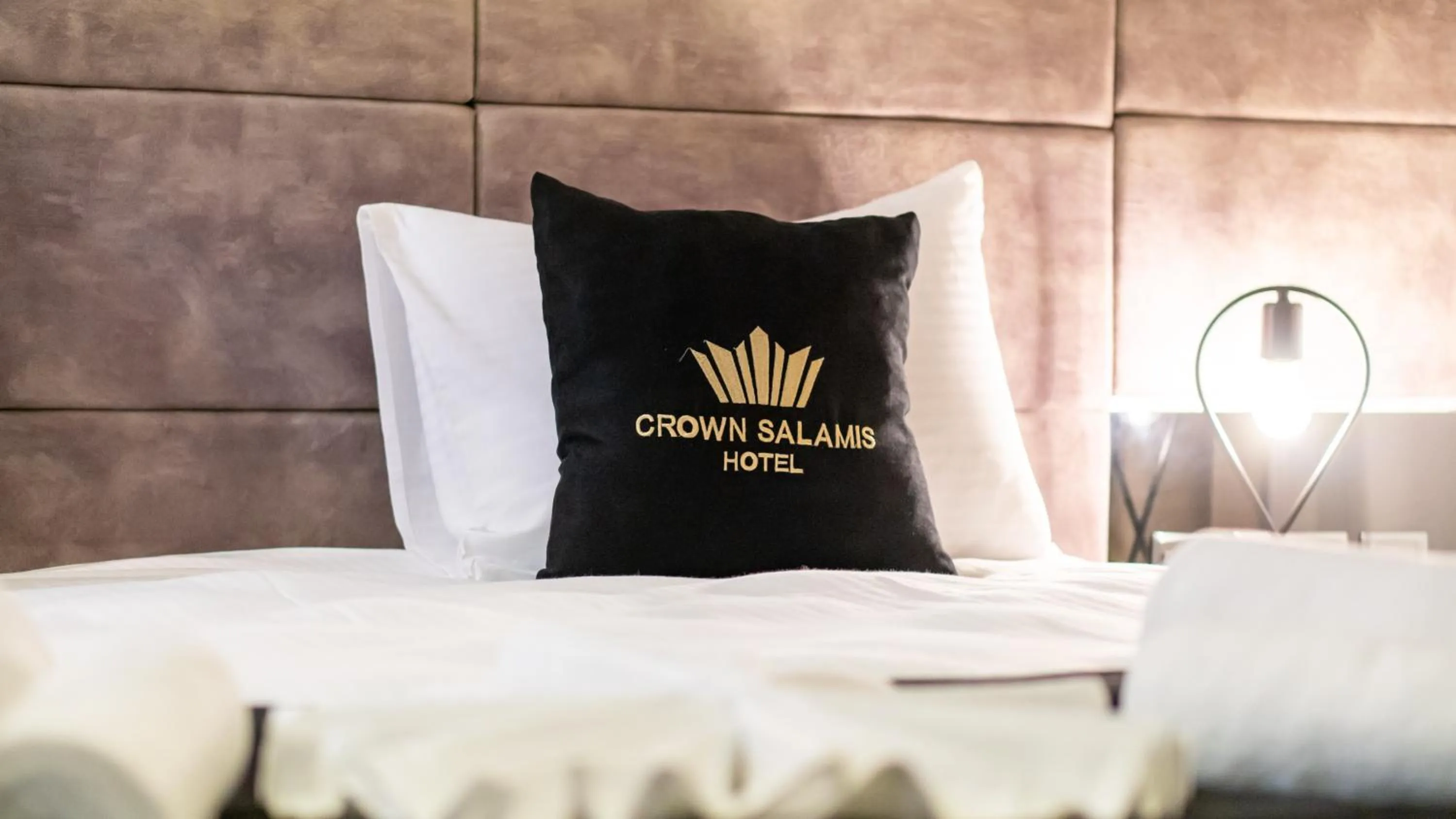 Bed in Crown Salamis Hotel