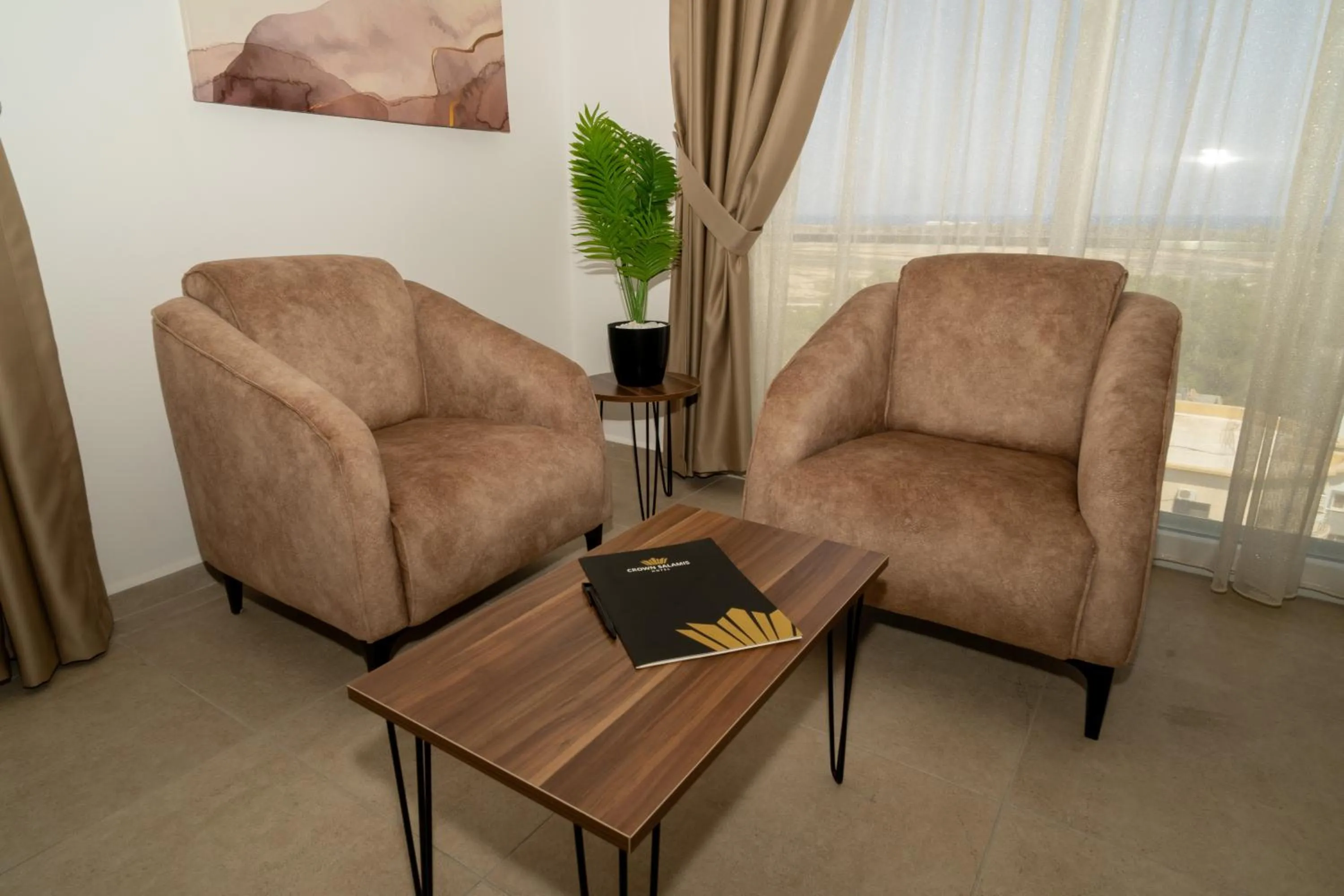 Seating area in Crown Salamis Hotel