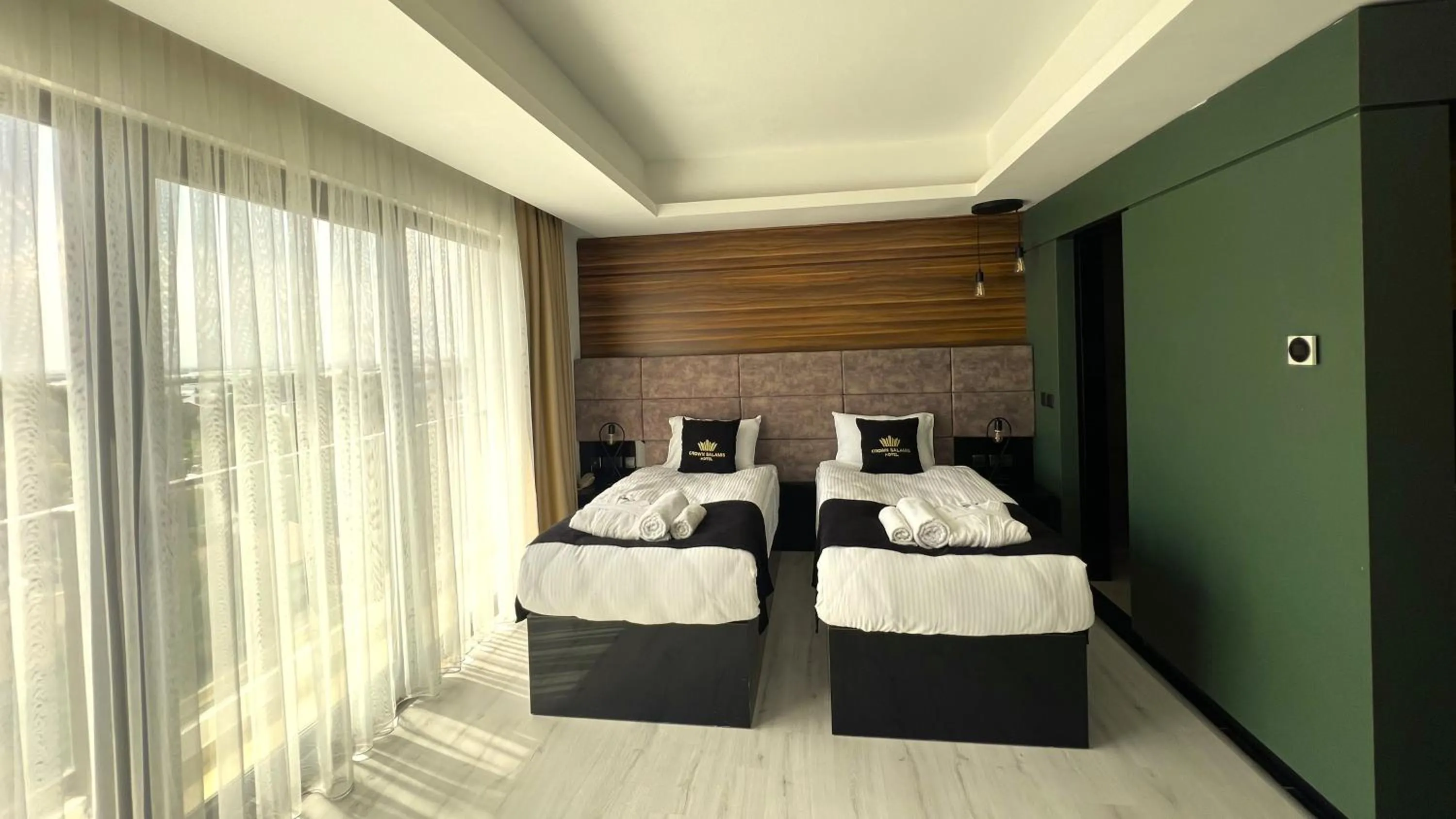 Bed in Crown Salamis Hotel