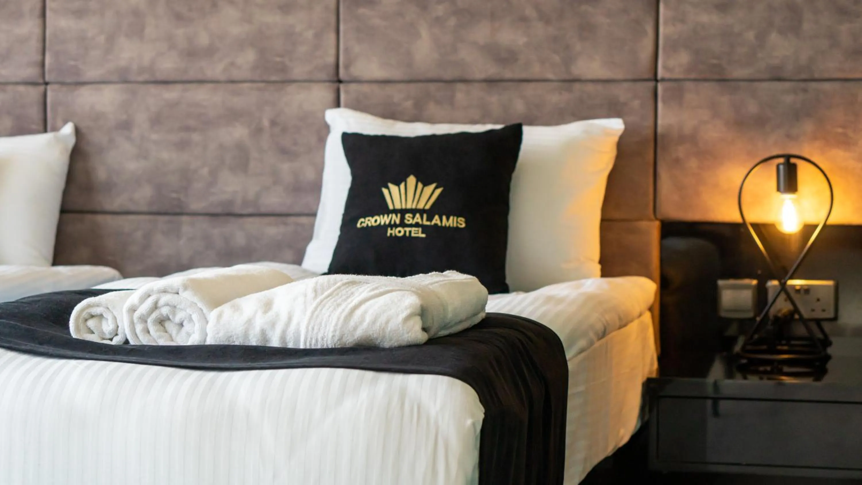 Bed in Crown Salamis Hotel