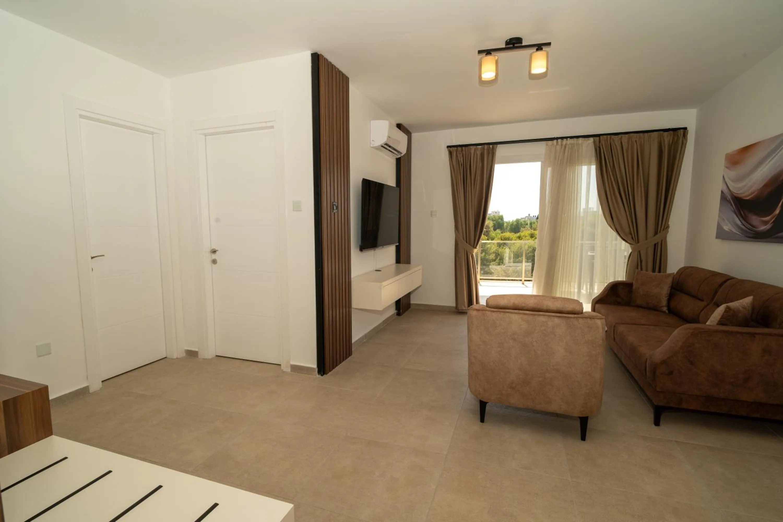 Living room in Crown Salamis Hotel