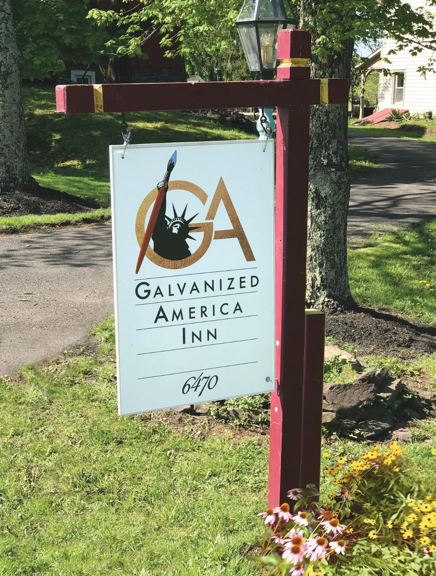 Property logo or sign in Galvanized America Inn & Art Gallery