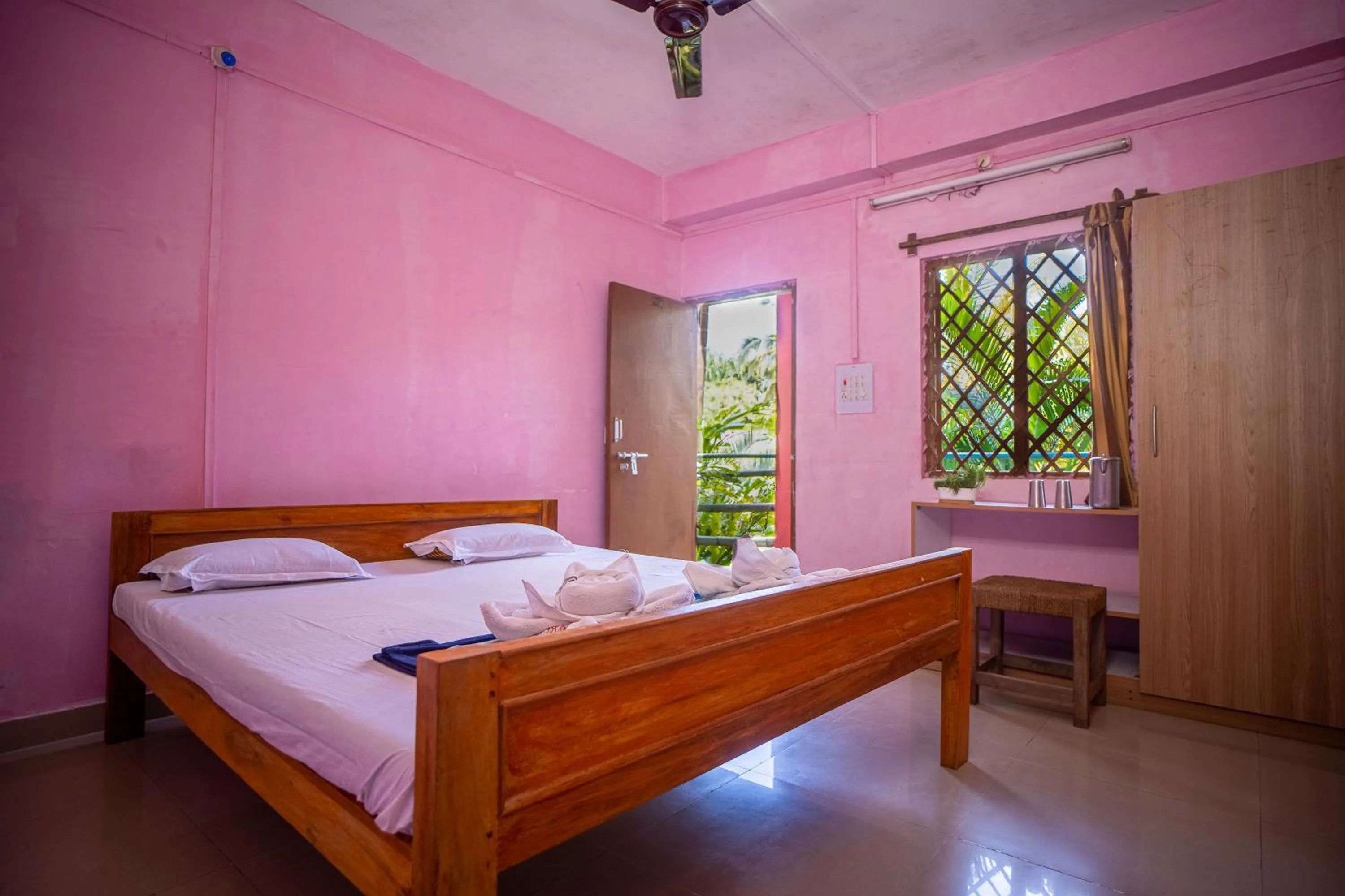 Balcony/Terrace, Bed in Palm Grove Eco Resort