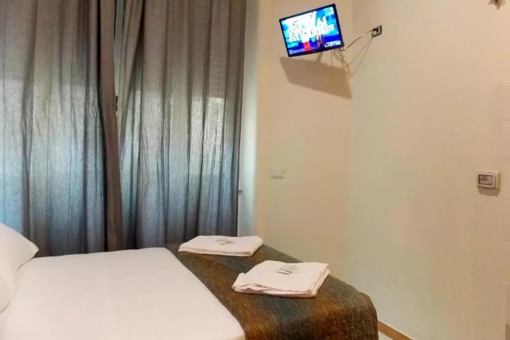 Bed in Hotel Midtown Milano