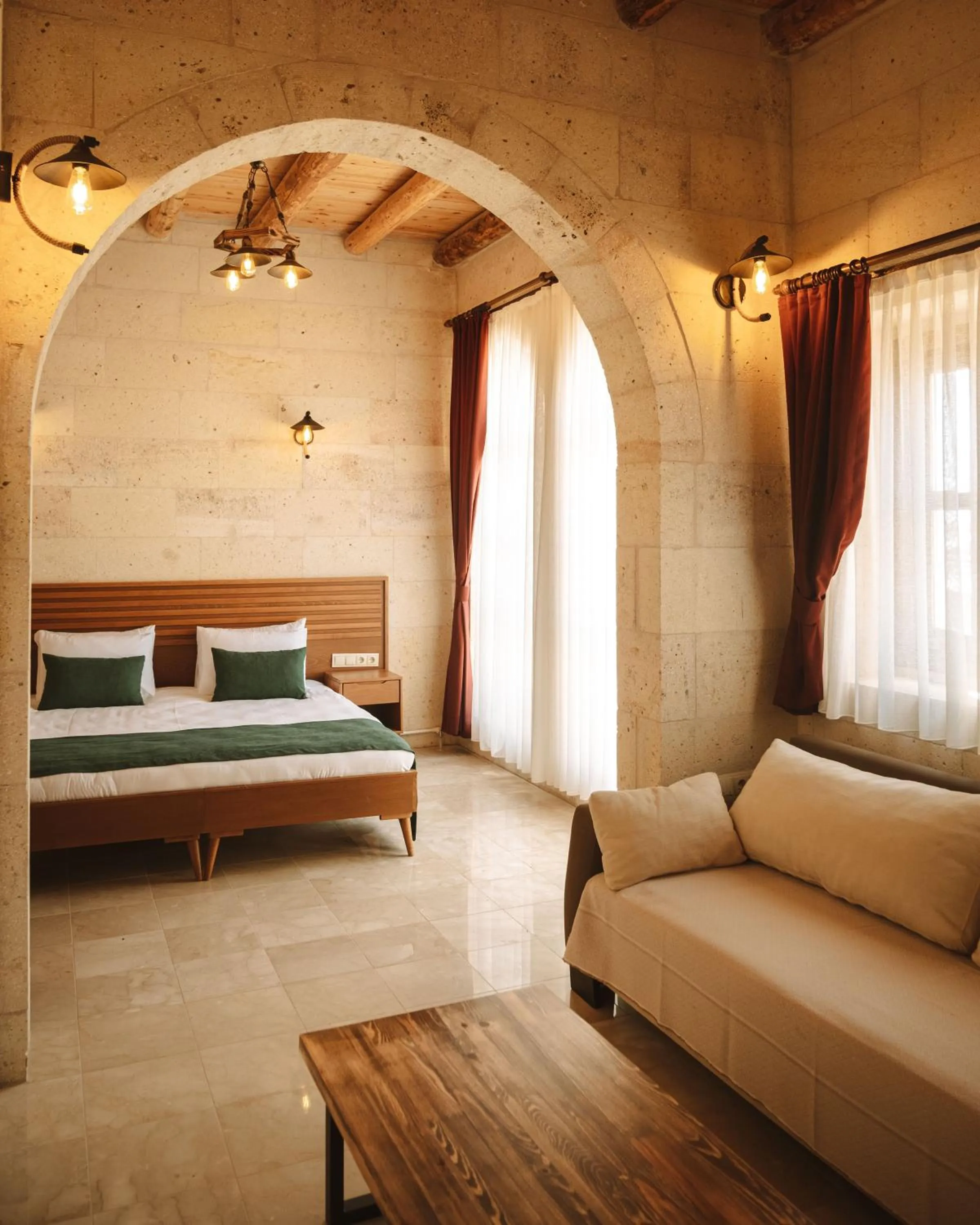 Seating area, Bed in Juno Cappadocia