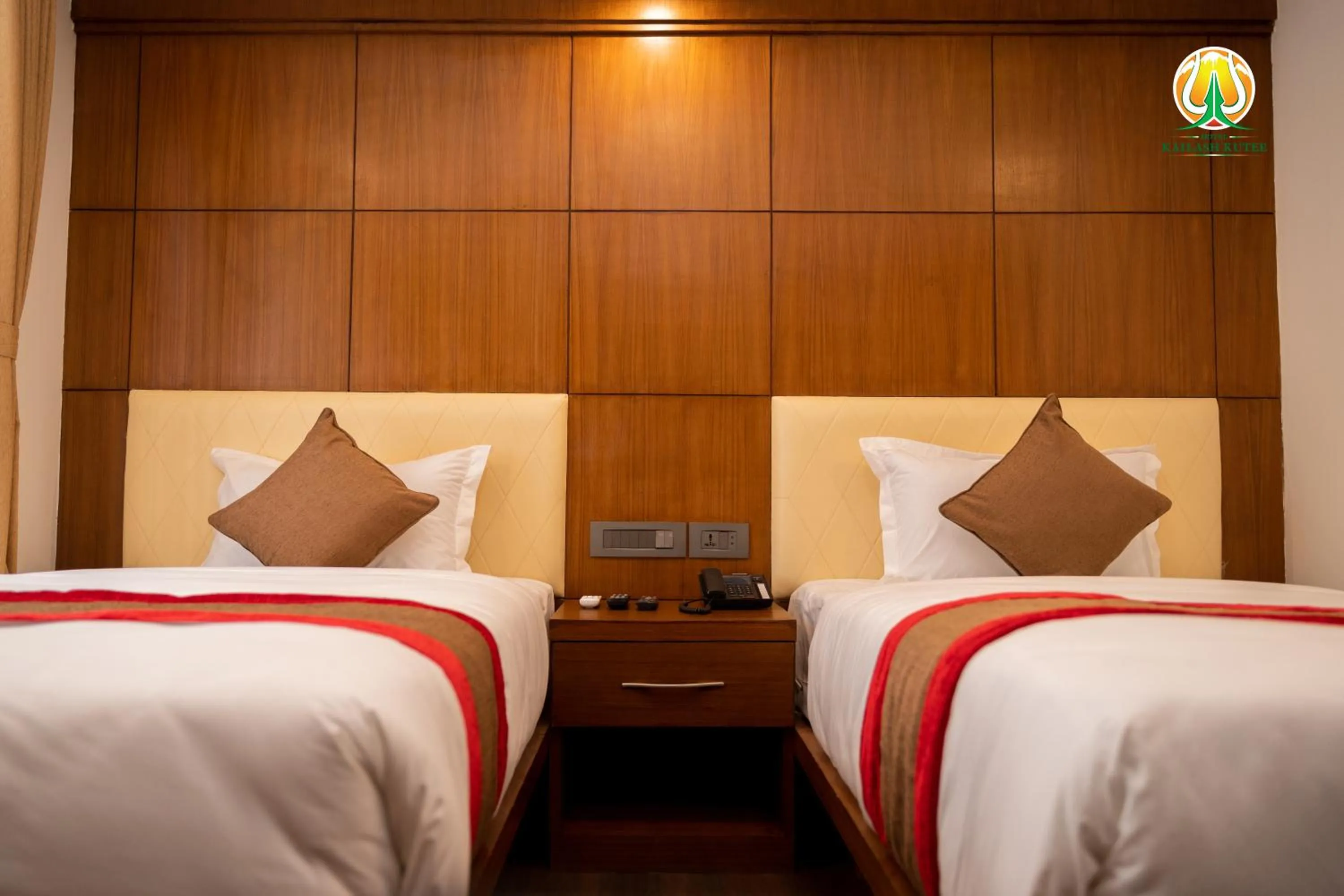 Bed in Hotel Kailash Kutee