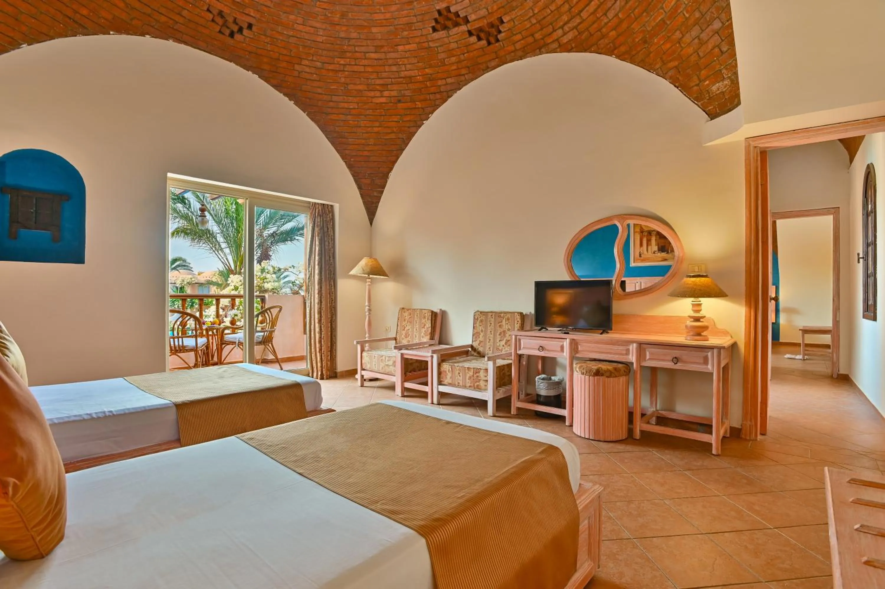 Communal lounge/ TV room, Bed in Dream Lagoon Resort & Aqua Park