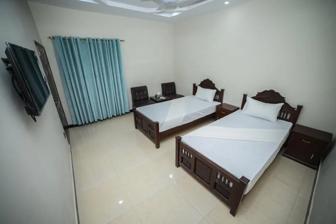 Bedroom in Royal Blue inn Hotel