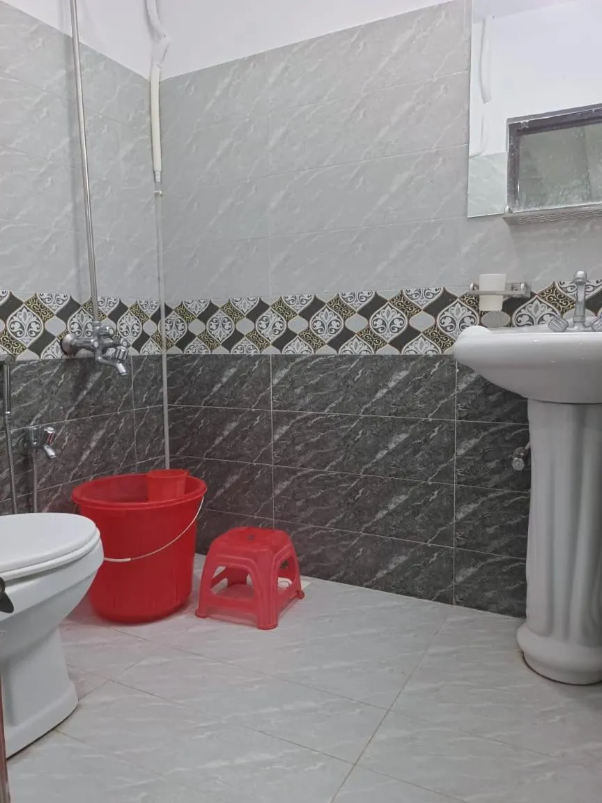 Bathroom in Royal Blue inn Hotel