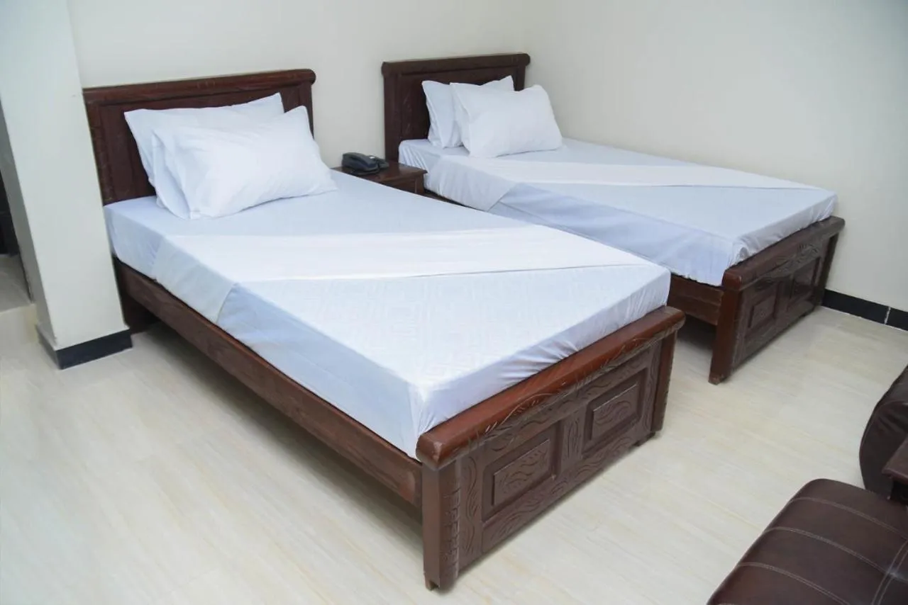 Bedroom in Royal Blue inn Hotel