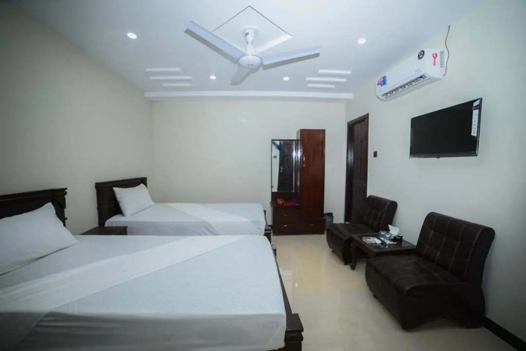 Bedroom in Royal Blue inn Hotel