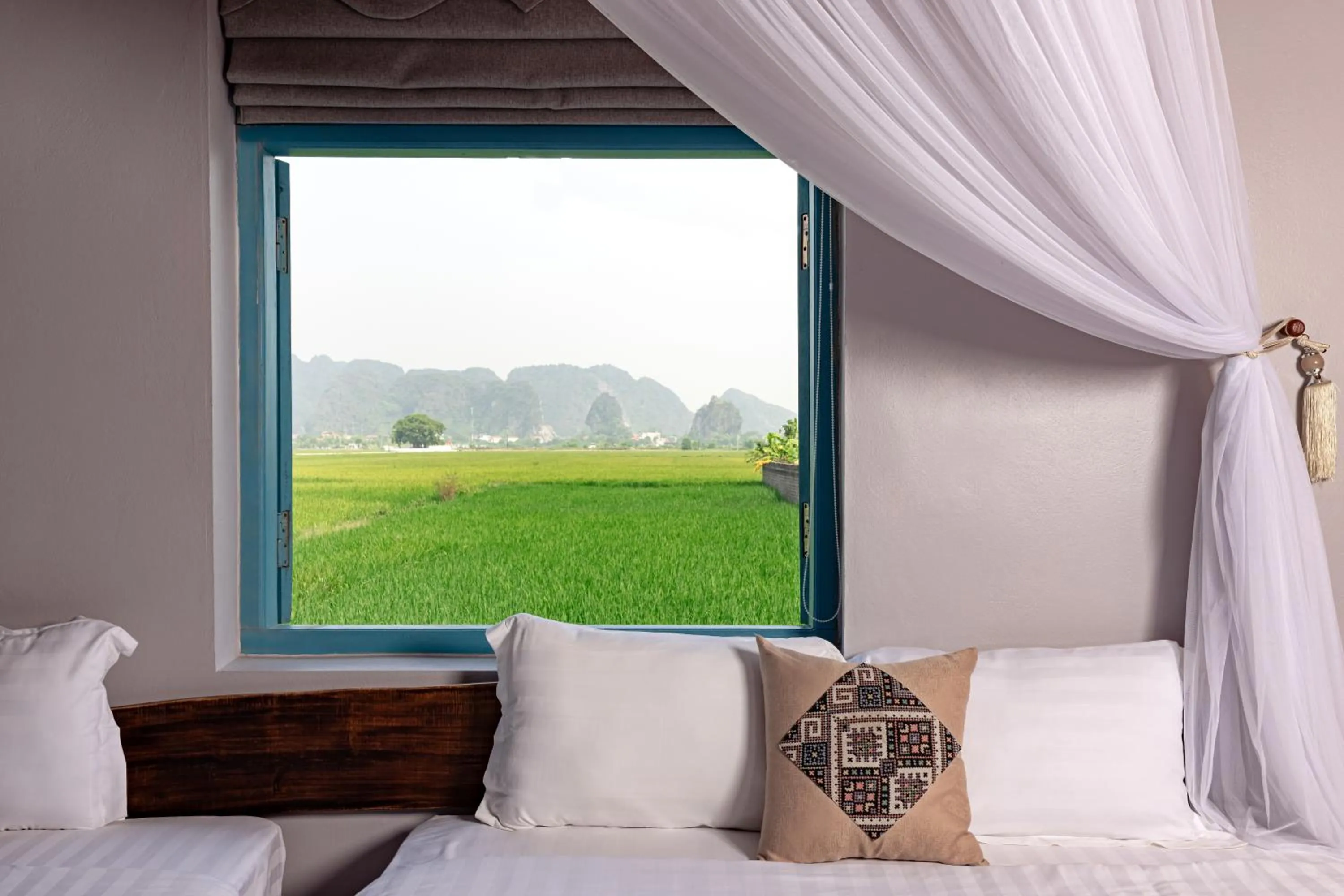 Bed in ChezCao Rice Field Ecolodge Ninh Binh