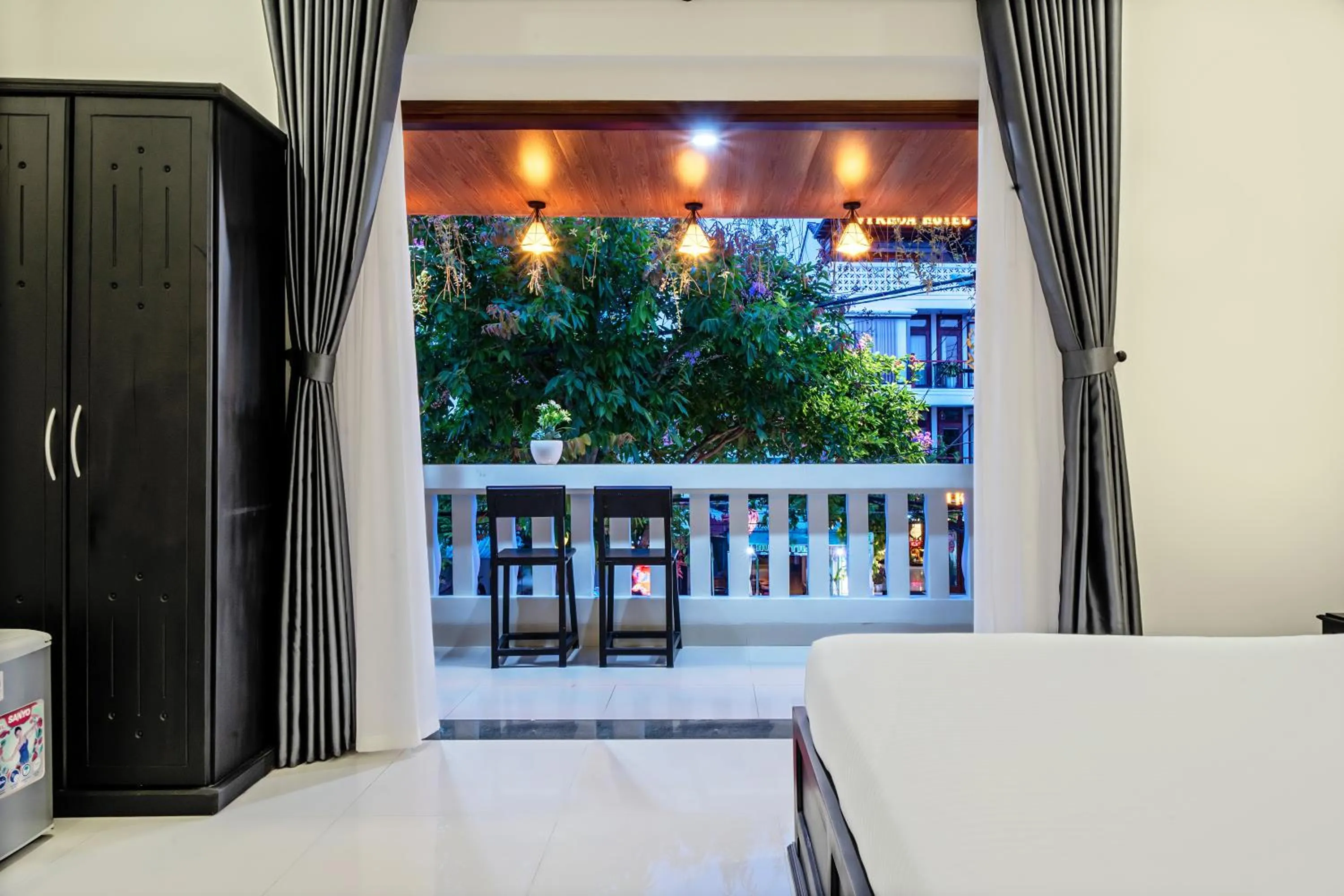 Balcony/Terrace, Bed in 1 Stop Dory Hotel