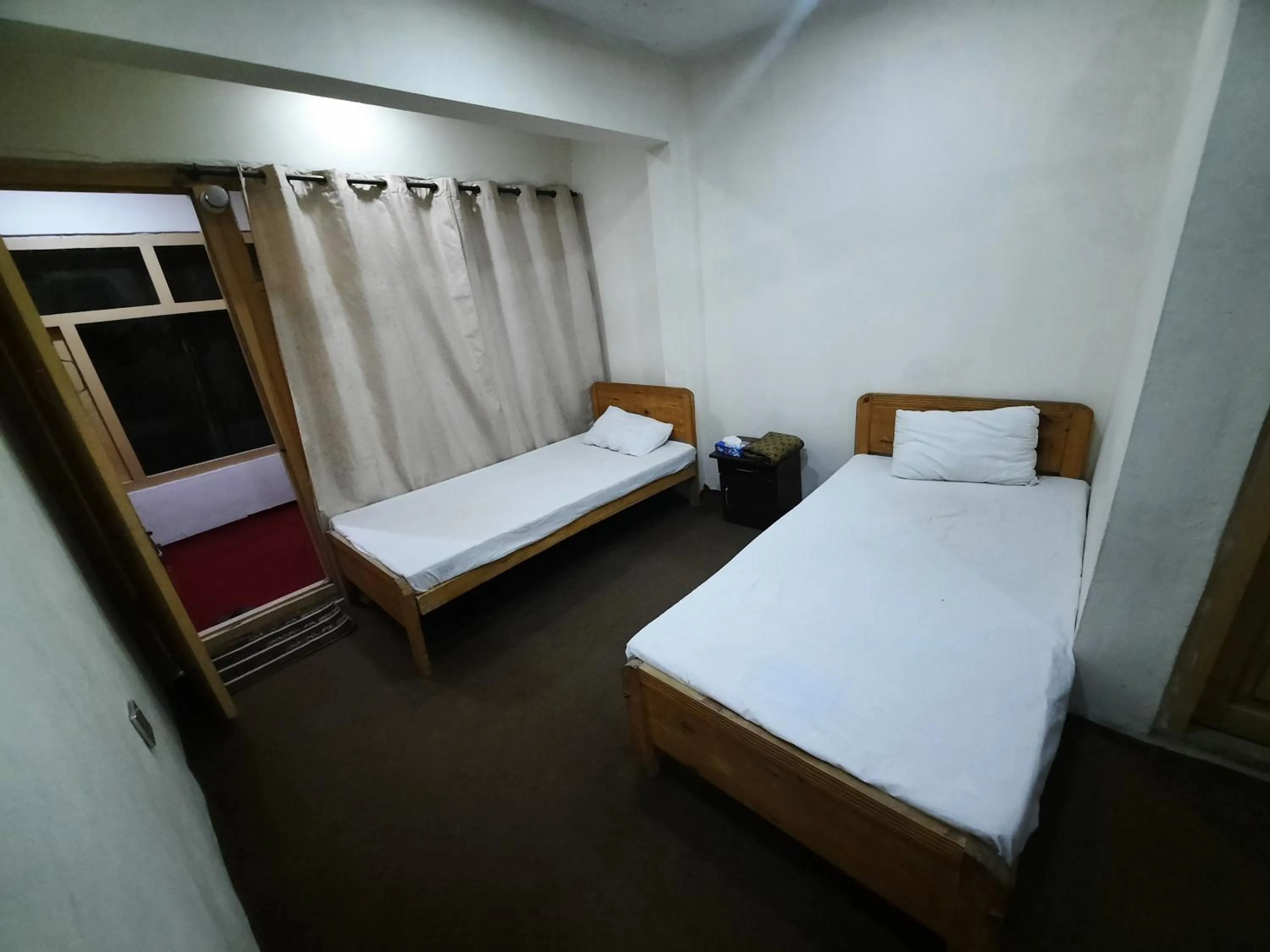 Bed in Highlander inn Skardu