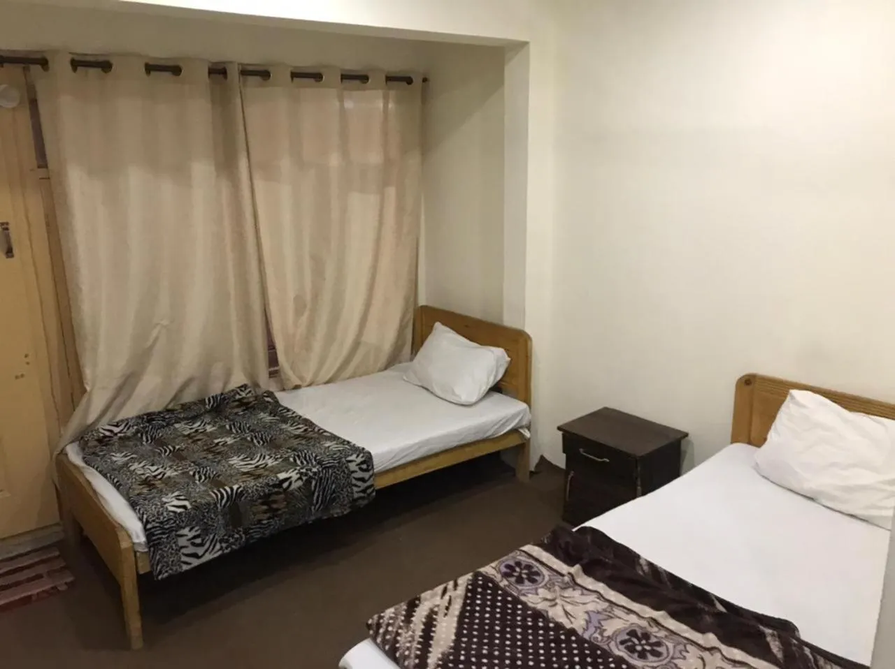 Bed in Highlander inn Skardu