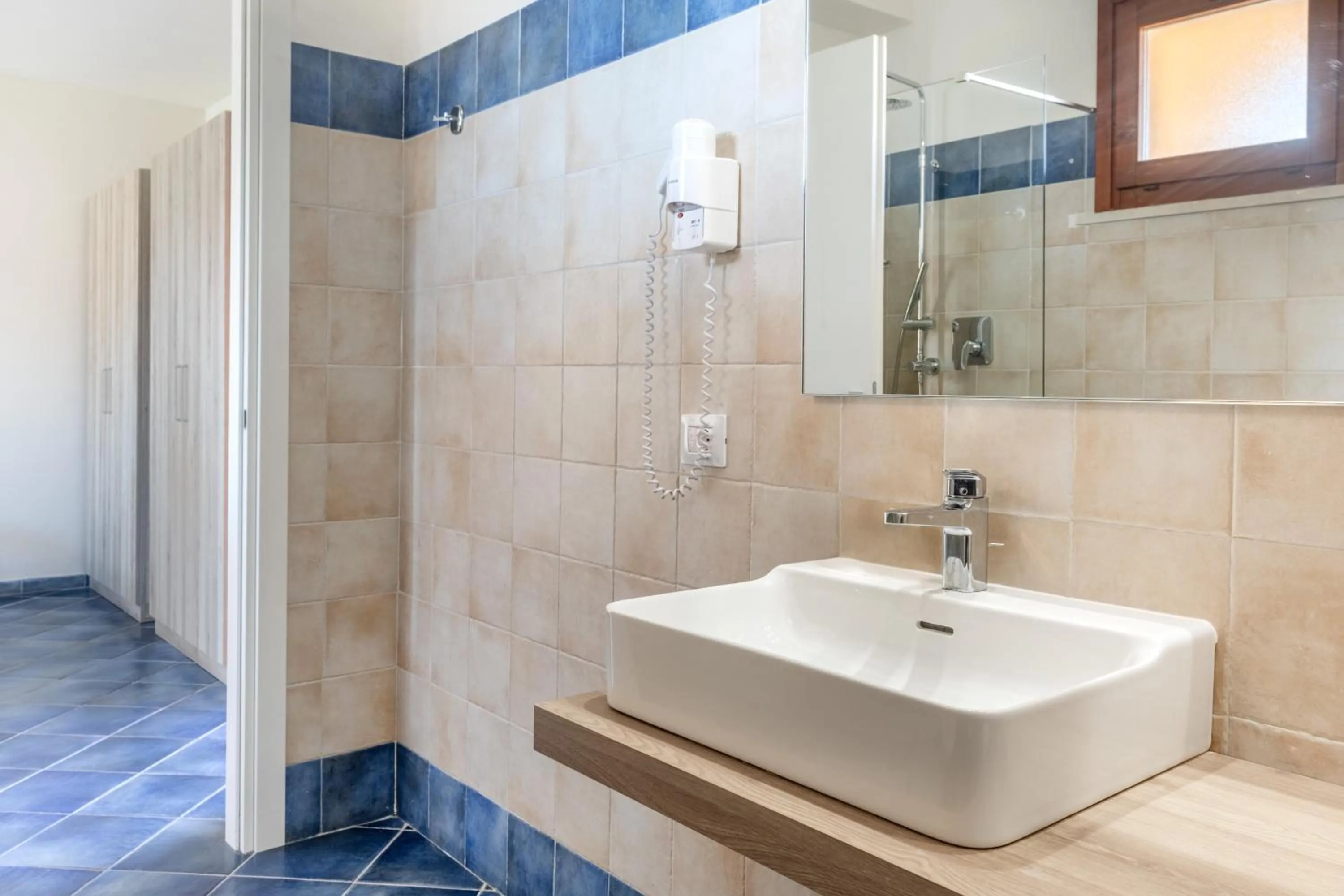 Bathroom in VOI Arenella Resort