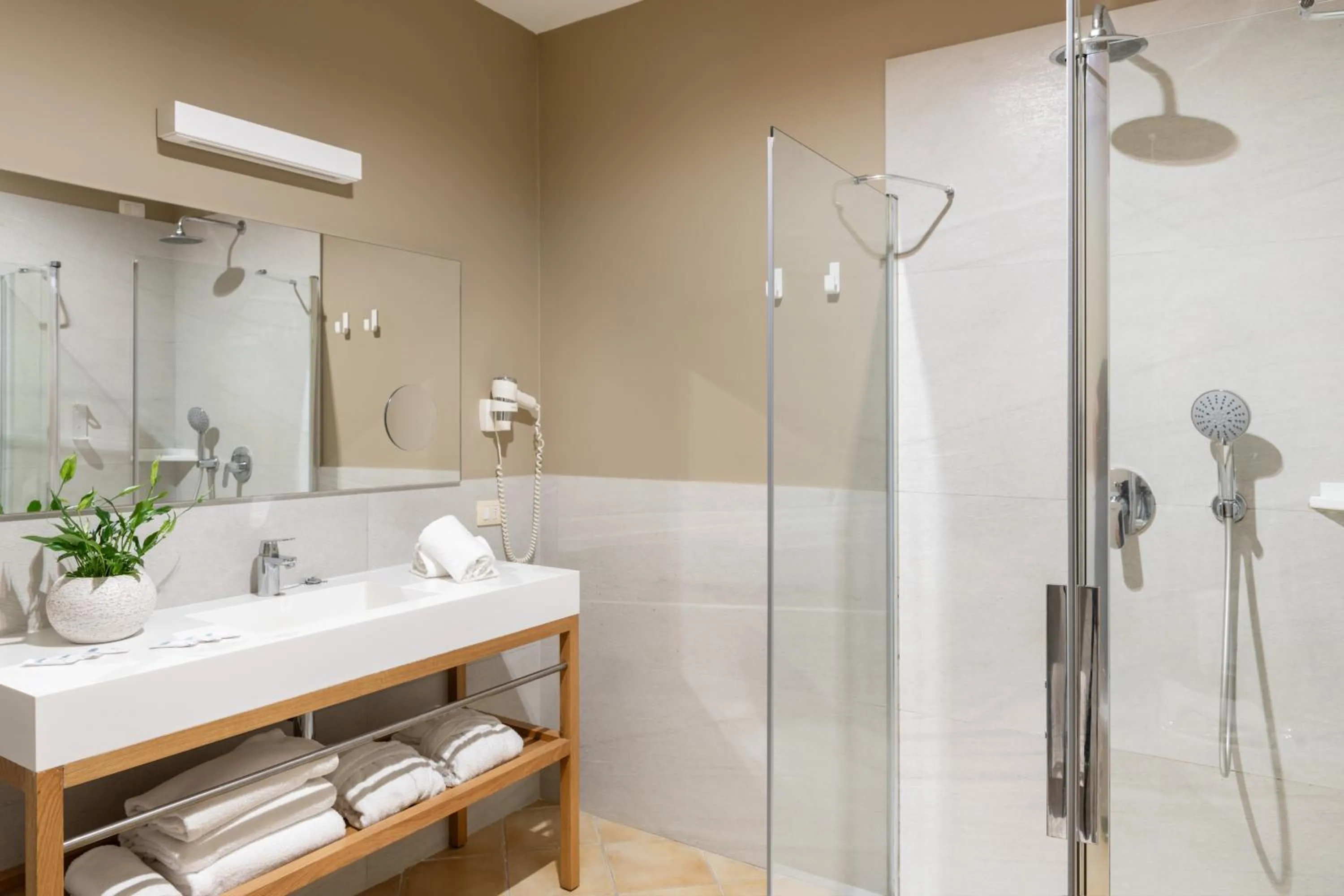 Bathroom in VOI Arenella Resort